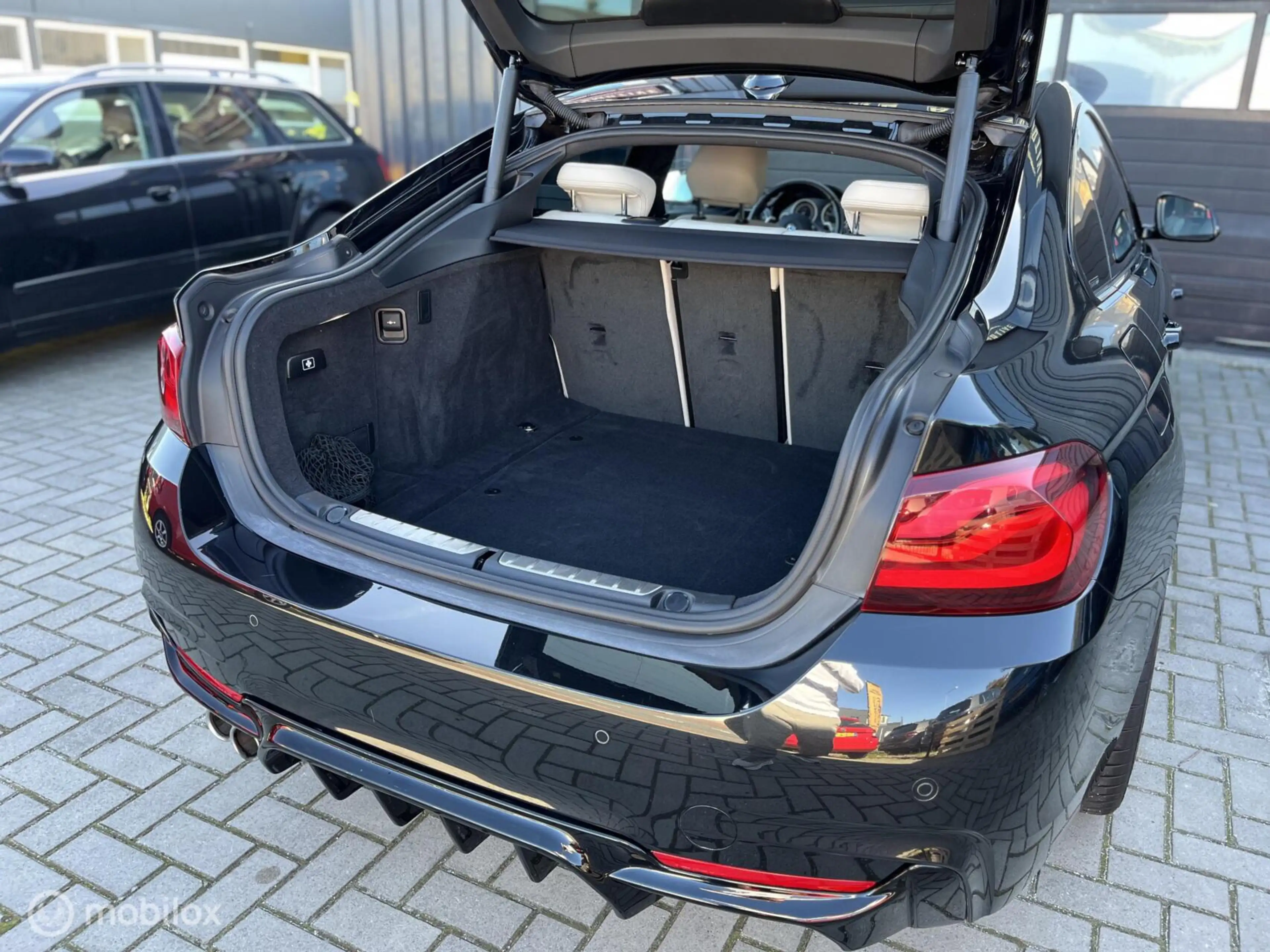 BMW 430 4-serie Coupé 430i xDrive High Executive — photo 25