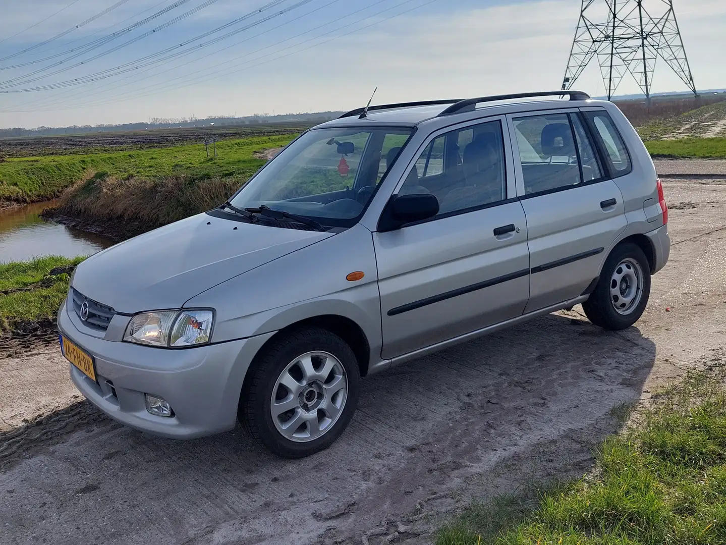 Mazda Demio 1.5 Exclusive Grijs - 1