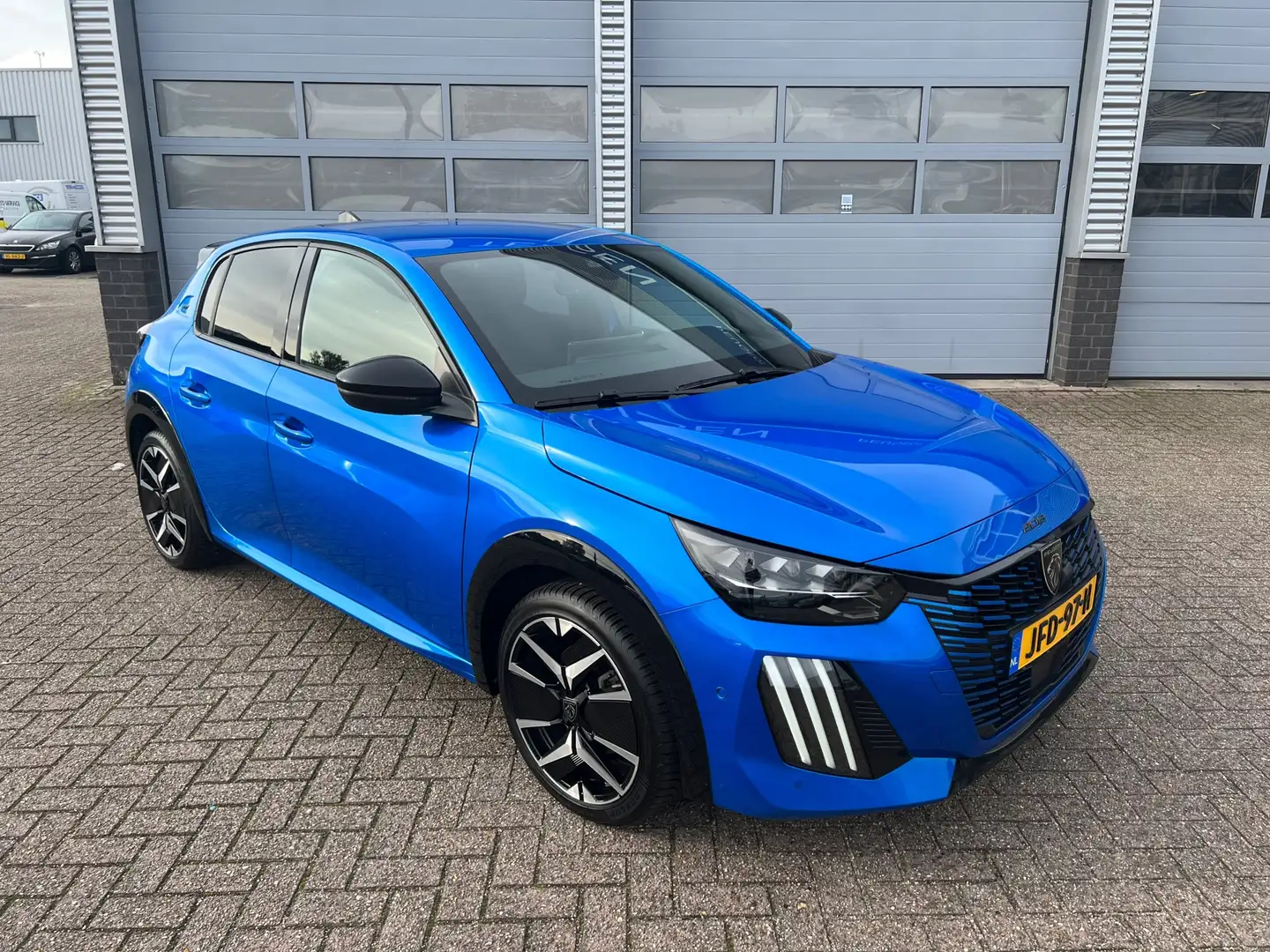 Peugeot 208 Hybrid 145 e-DCS6 GT | Half leer | Navigatie | Ada Blauw - 2
