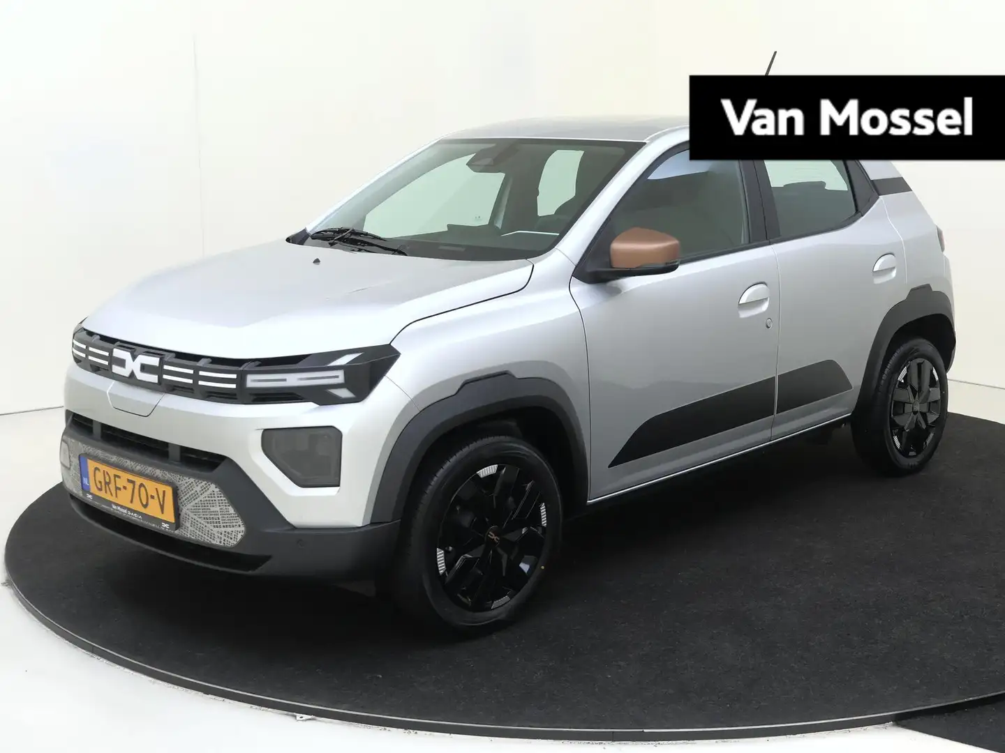 Dacia Spring Extreme 65 26.8 kWh | DC Lader / Camera / Navi / p Grijs - 1