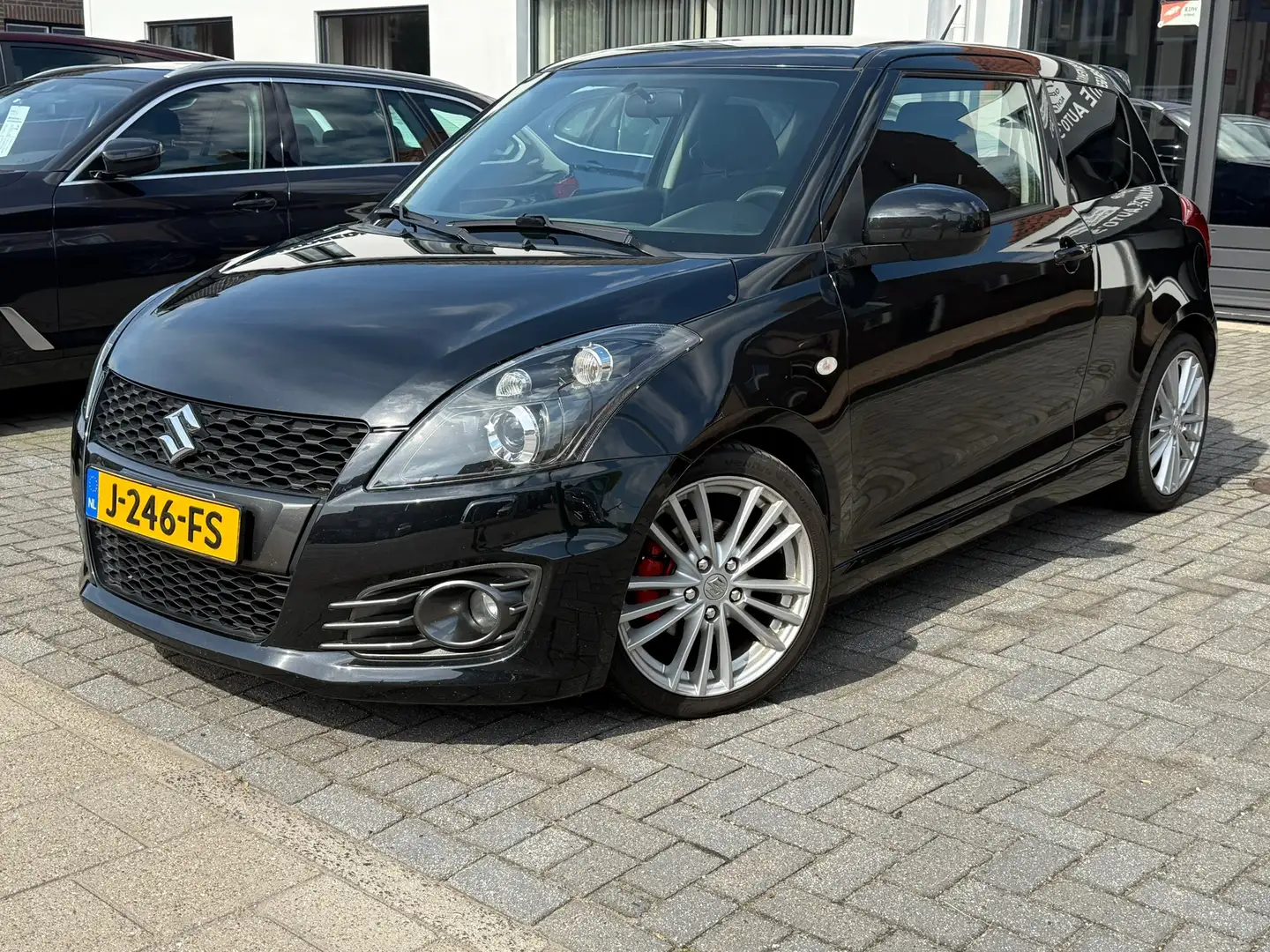 Suzuki Swift 1.6 Sport, Navigatie,Climate control,L.M.Velgen,Pa Nero - 1