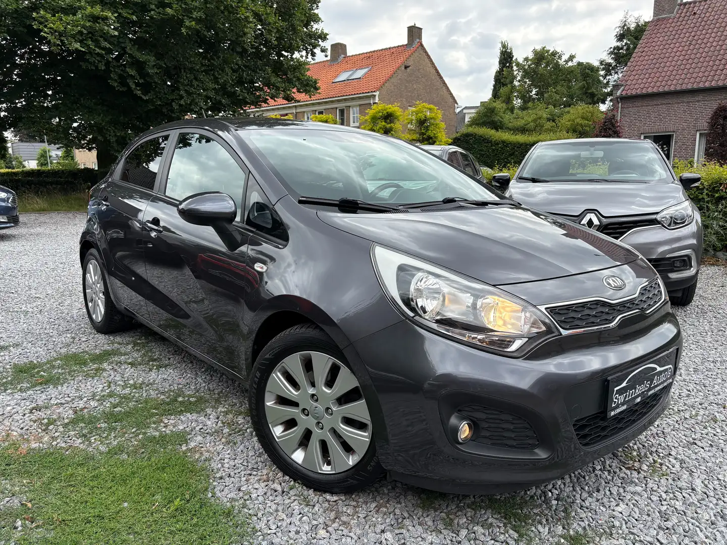 Kia Rio 1.4 CVVT-World Cup Edition-109 pk-incl. garantie Grijs - 2