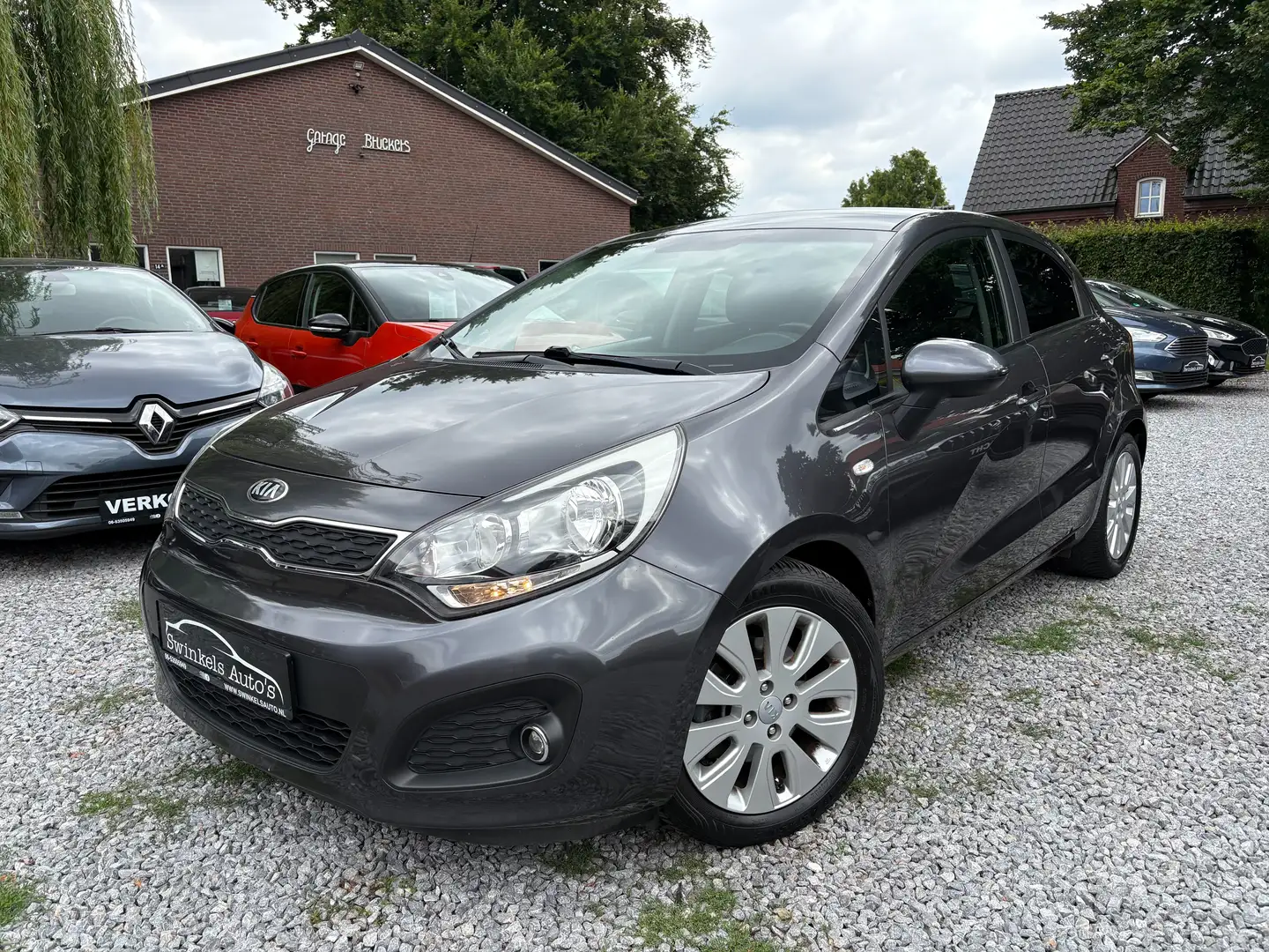 Kia Rio 1.4 CVVT-World Cup Edition-109 pk-incl. garantie Grijs - 1