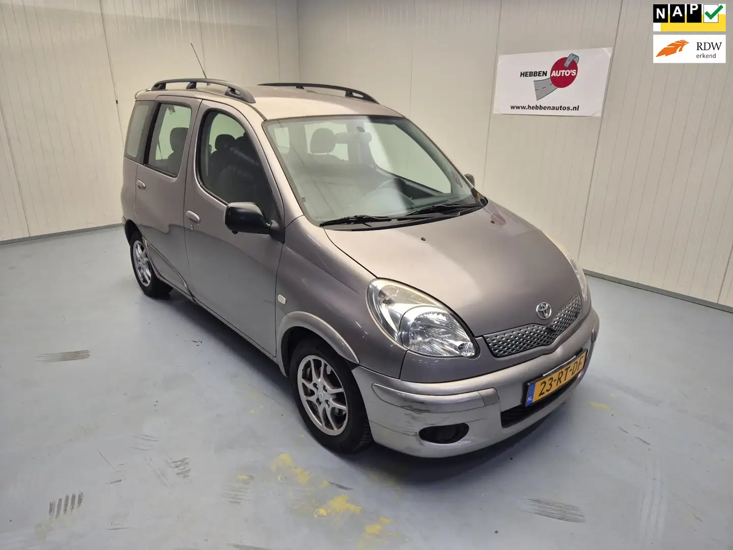 Toyota Yaris Verso 1.3 VVT-i Sol Automaat Navi Camera Alu Trekh Grau - 1