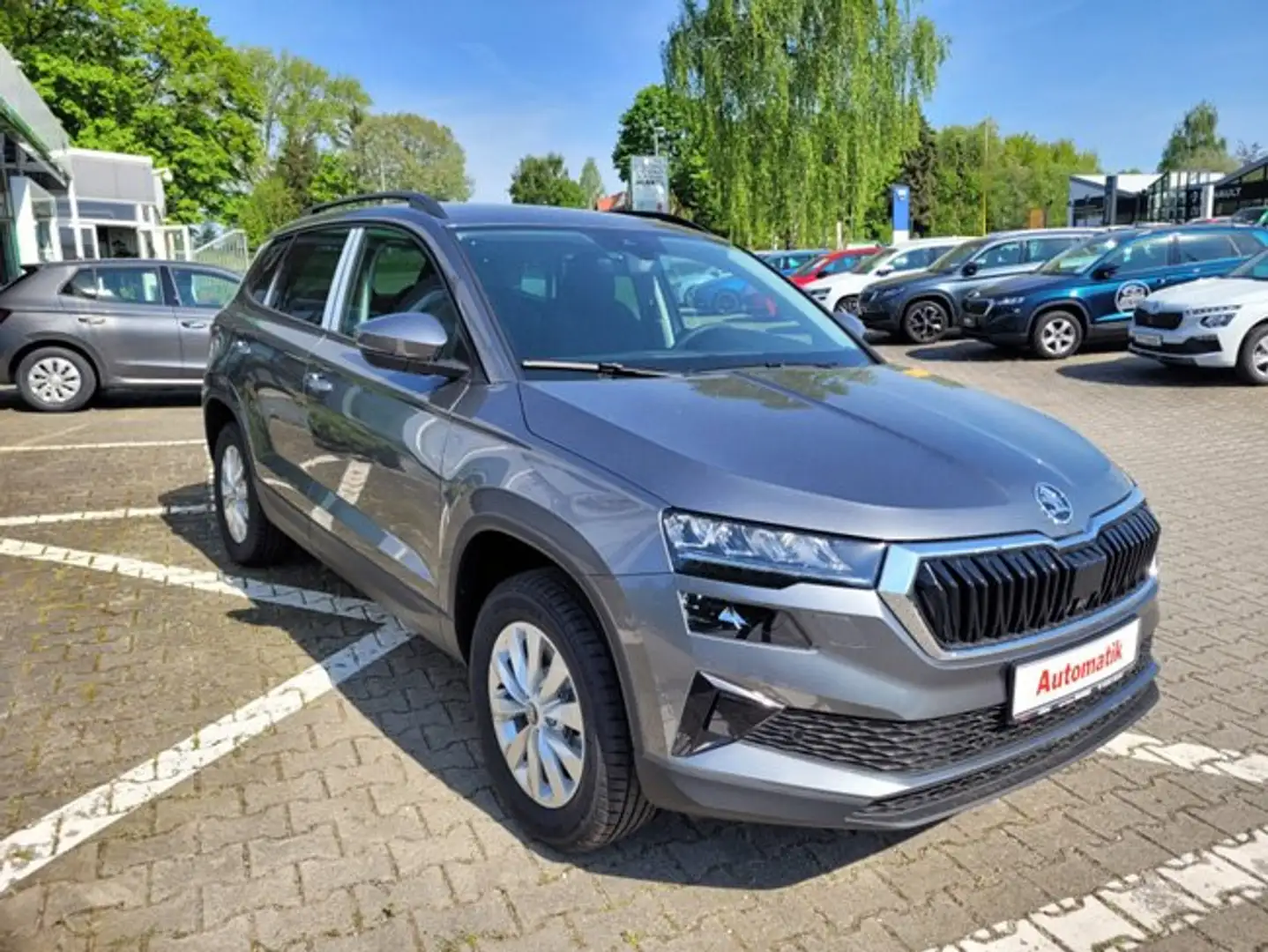 Skoda Karoq 1.5 TSI Comfort + ** DSG ** AHK ** Winterpaket ** Grijs - 1