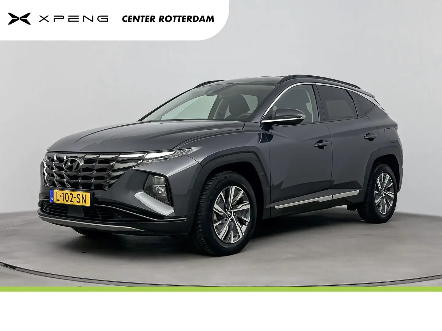 Hyundai TUCSON 1.6 T-GDI HEV Comfort Smart | Navigatie | Cruise C Gris - 1