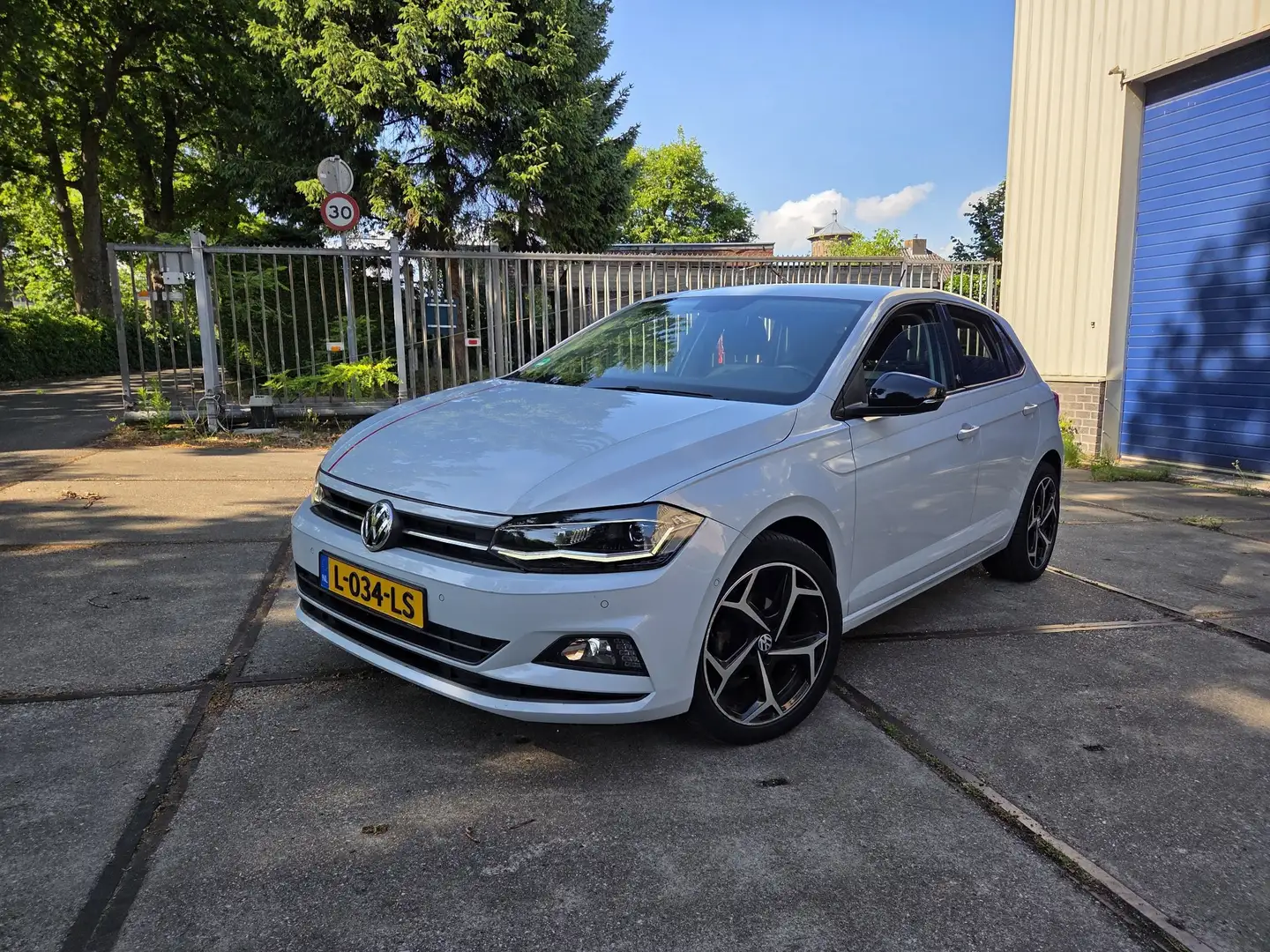Volkswagen Polo 1.0 TSI Highline Parelmoer wit BEATS UITVOERING Wit - 1