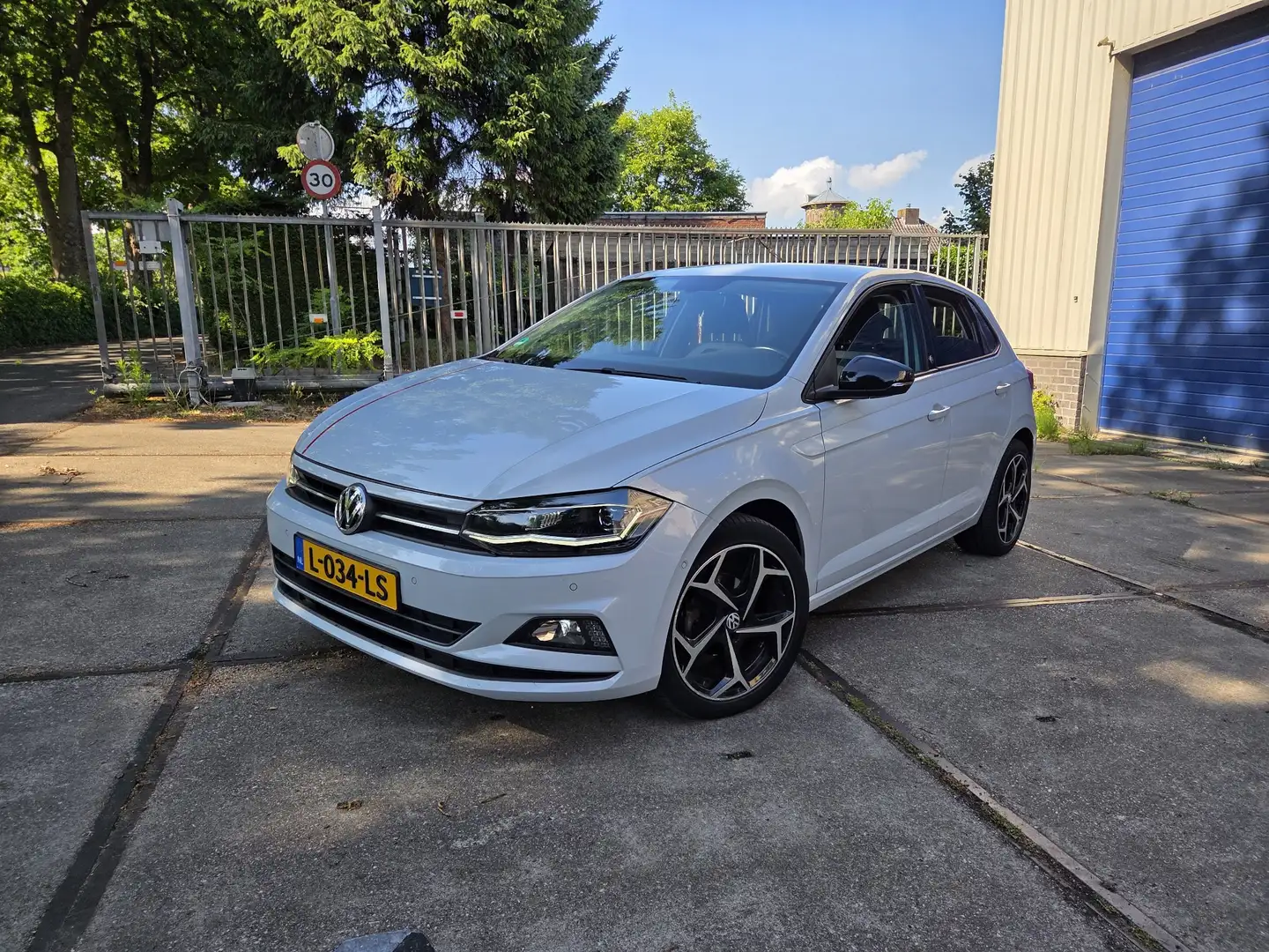 Volkswagen Polo 1.0 TSI Highline Parelmoer wit BEATS UITVOERING Wit - 2