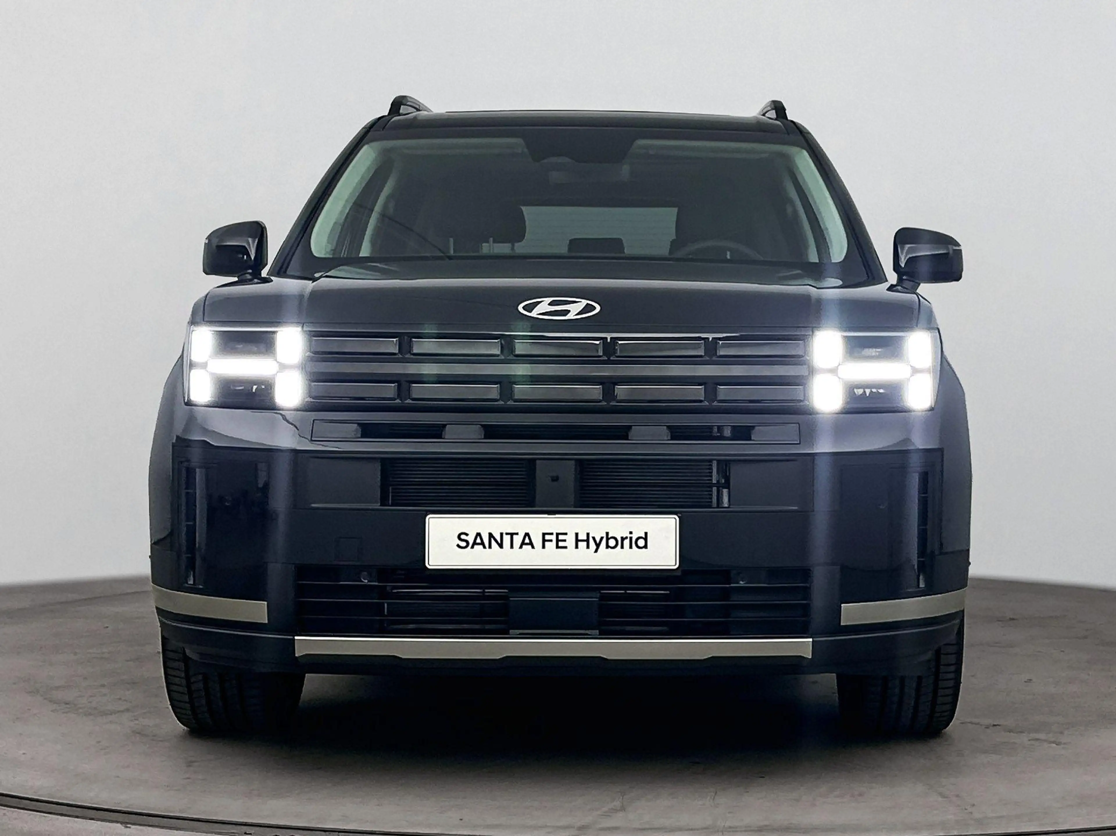 Hyundai SANTA FE 1.6 T-GDI HEV Premium Sky 7p | Apple Carplay/Andro — photo 4