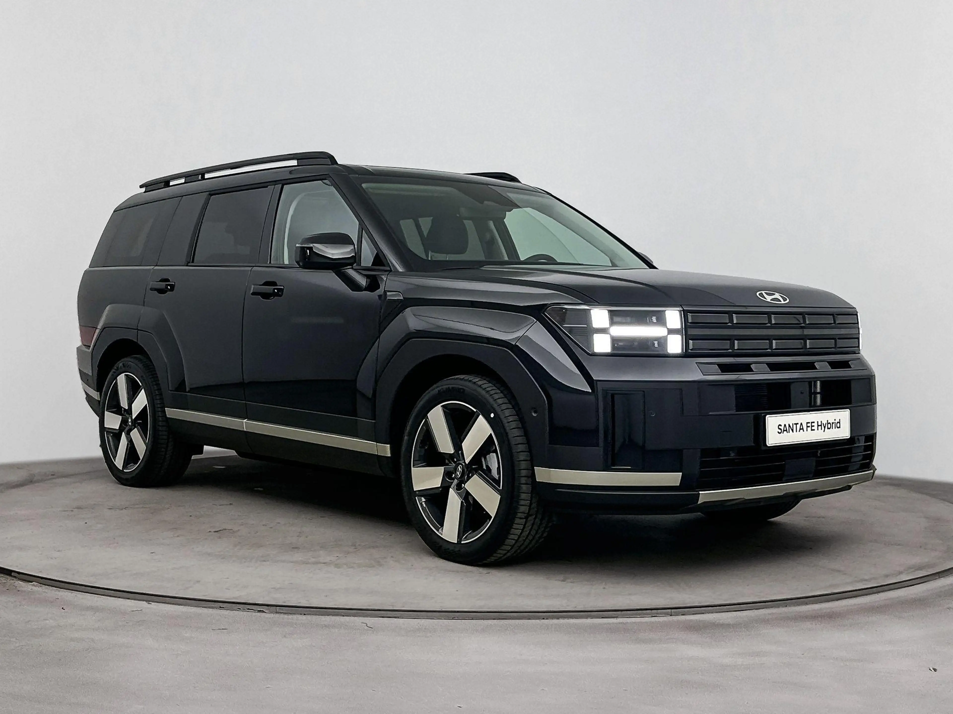 Hyundai SANTA FE 1.6 T-GDI HEV Premium Sky 7p | Apple Carplay/Andro — photo 6