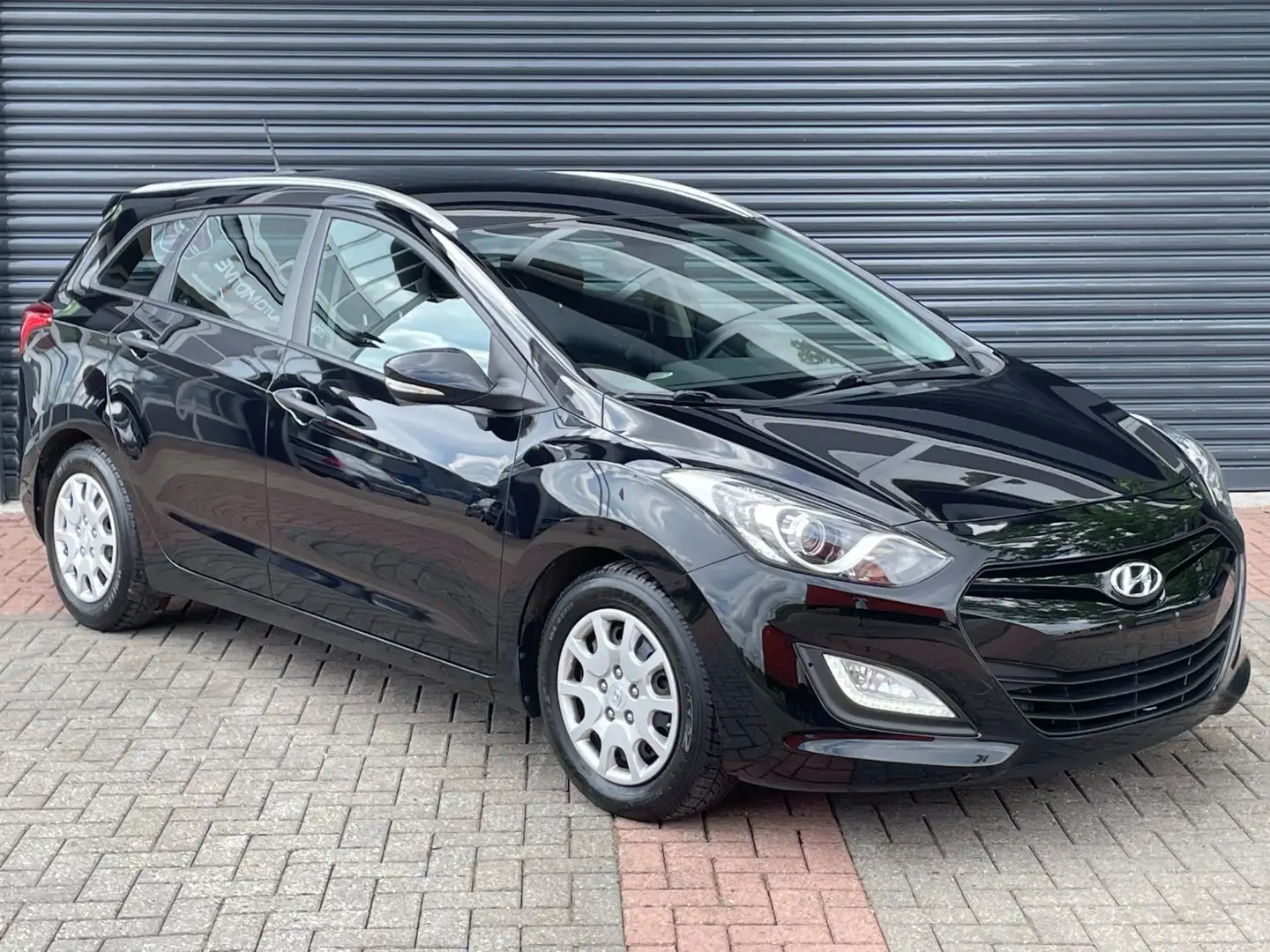 Hyundai i30 CW 1.4i i-Motion Business Cruise | Pdc | Navi | We Zwart - 2