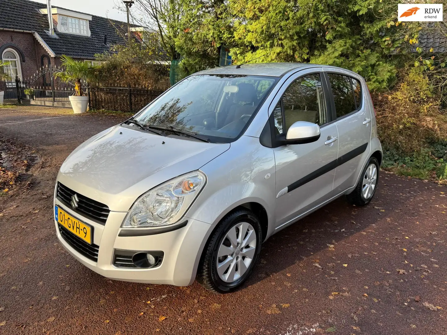 Suzuki Splash 1.2 Exclusive / Airco / Apk / Aux / Lm / Trekhaak Gris - 1