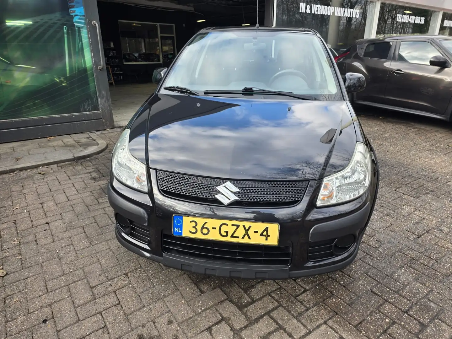 Suzuki SX4 1.6 Comfort | 12MND GARANTIE | NW APK | AIRCO | EL Zwart - 2