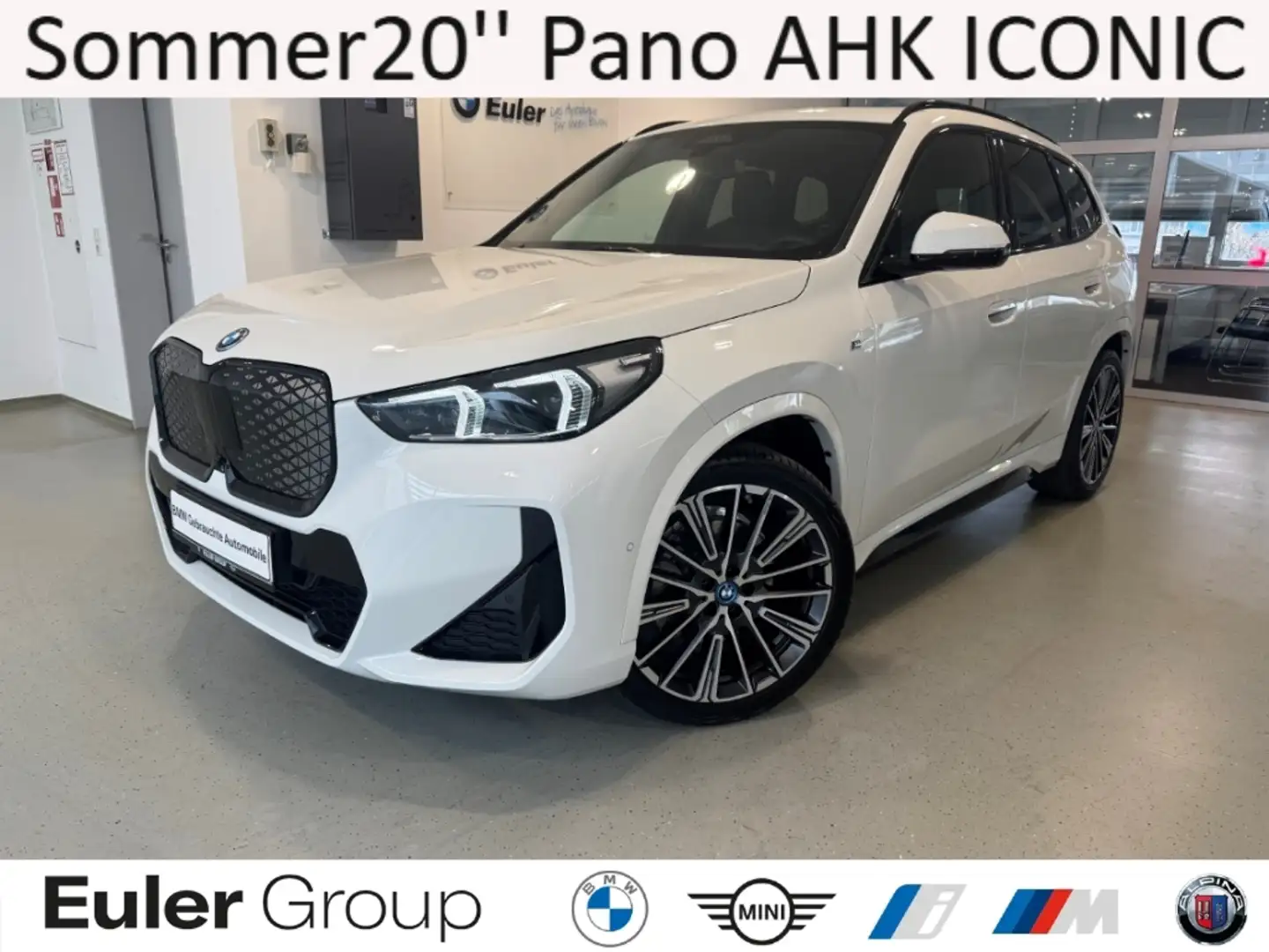 BMW iX1 30 M-Sport Sommer20'' Pano ParkAss+ AHK ICONIC Ad- Weiß - 1
