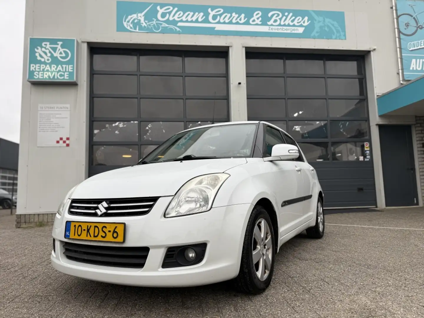 Suzuki Swift 1.3 Limited Wit - 1