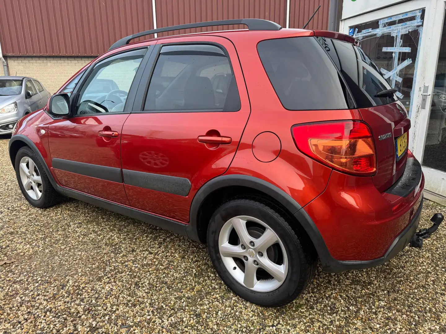 Suzuki SX4 1.6 airco, elektr ramen, trekhaak, zeer nette auto Oranje - 2