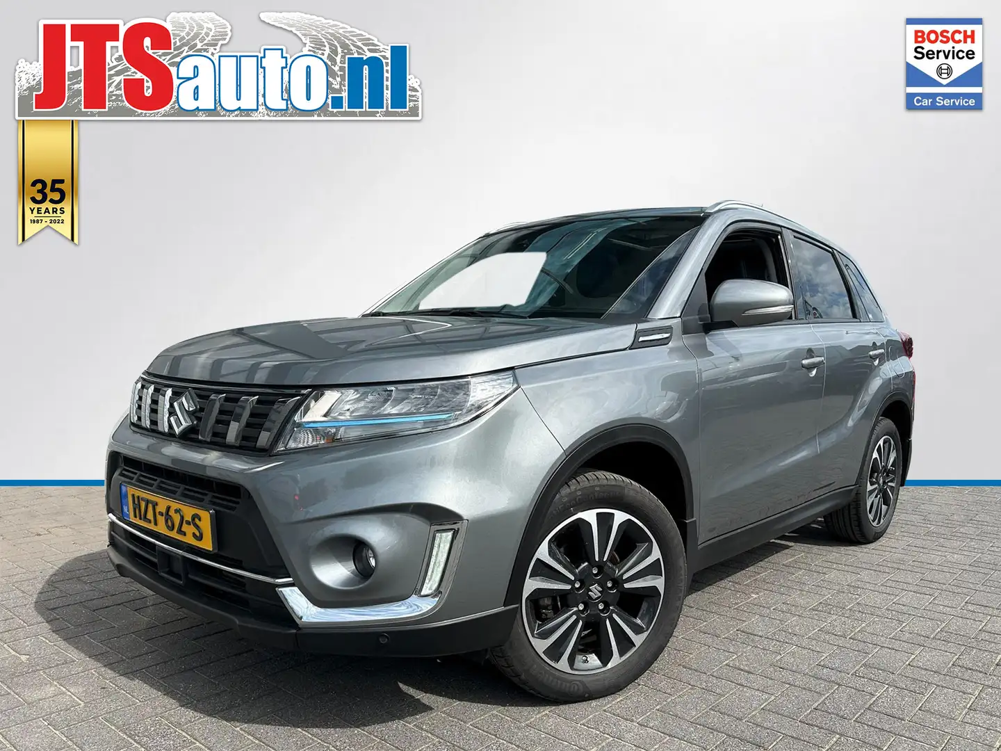 Suzuki Vitara 1.4 Smart Hybrid Style, Carplay, Trekhaak, Panoram Gris - 1