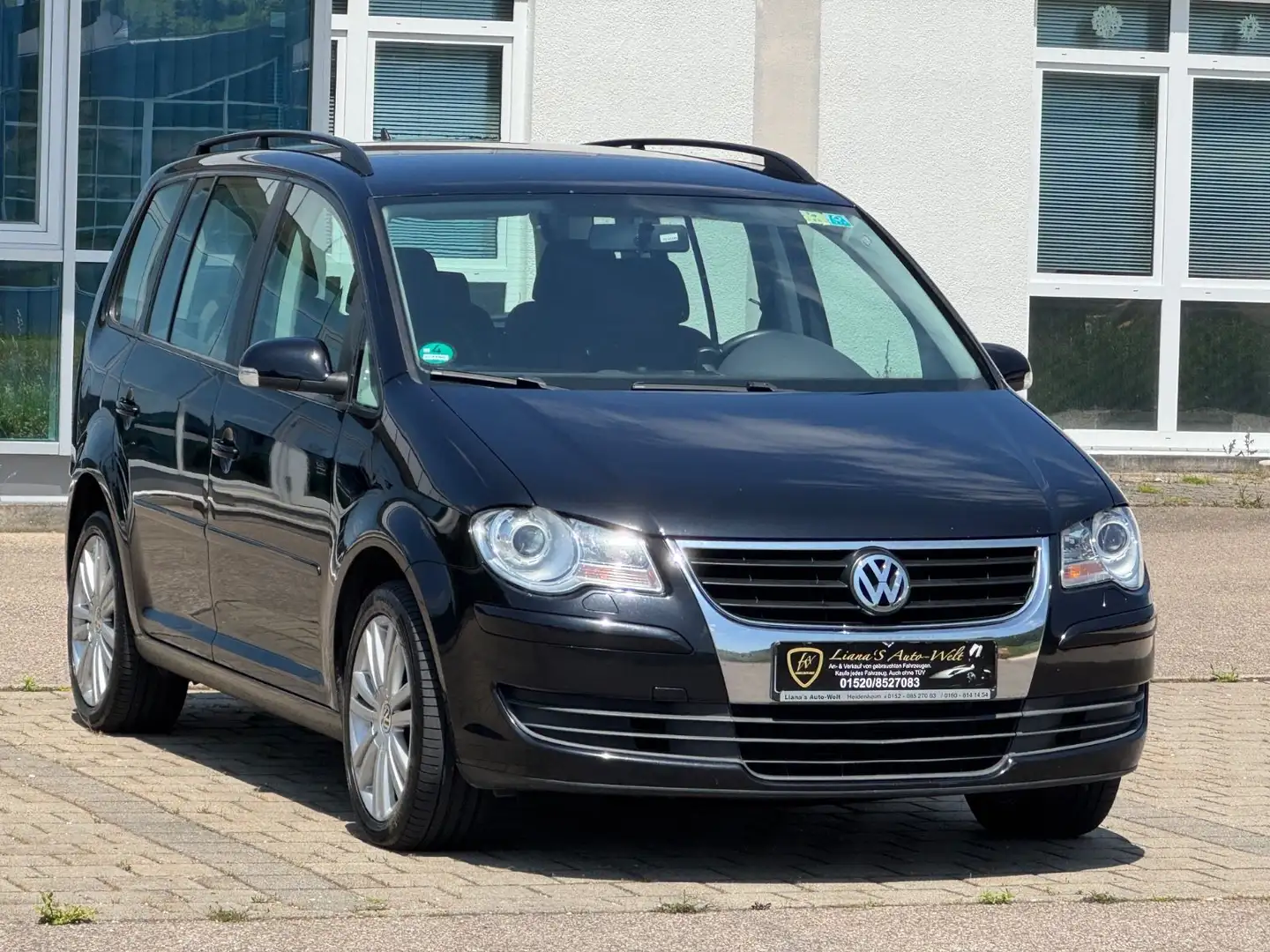 Volkswagen Touran Trendline 7Sitzer Navi AHK PDC TÜV/AU Neu Negro - 1