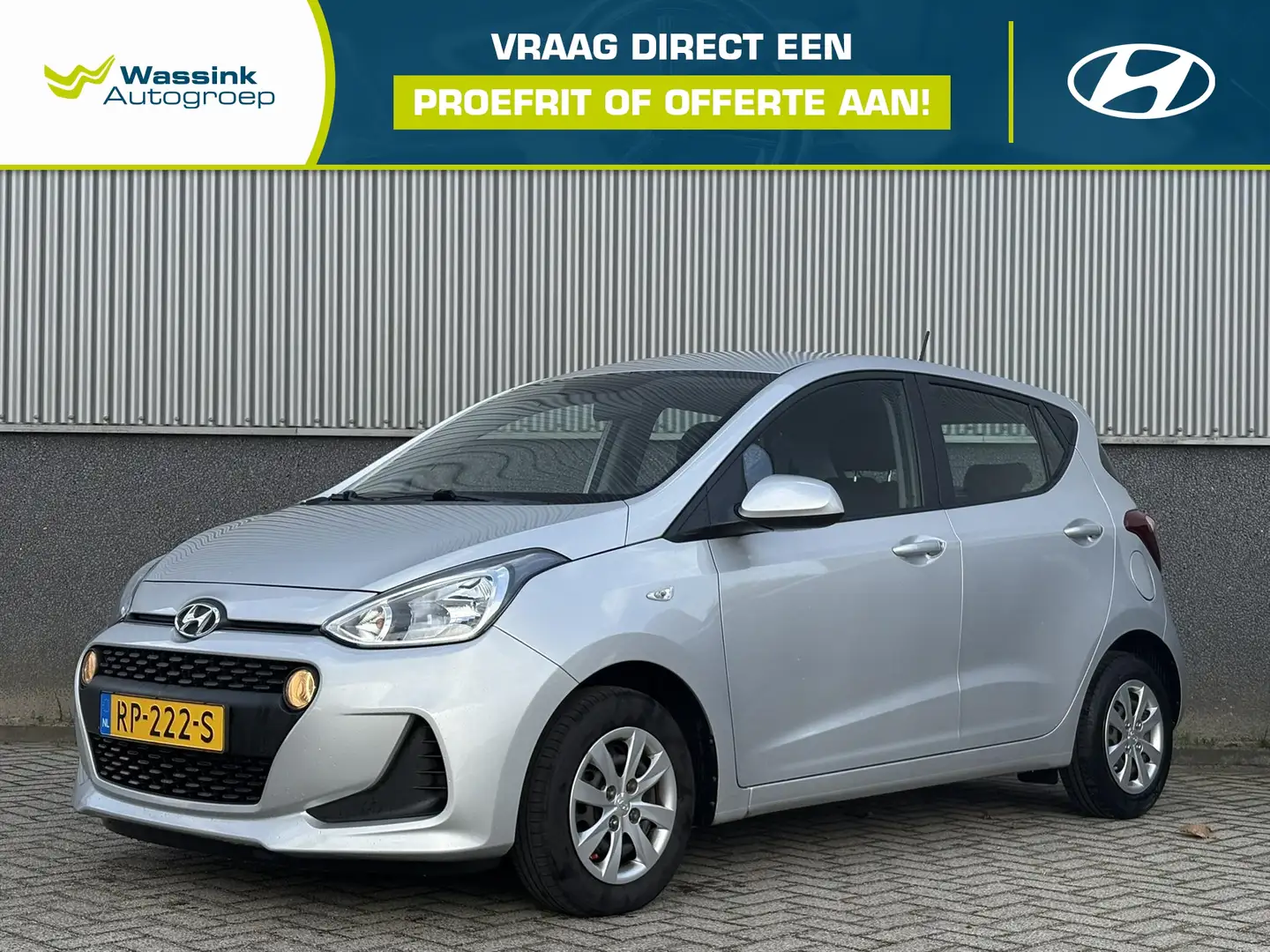 Hyundai i10 1.0i Blue 66pk Comfort | Navigatie | Cruise Contro Grijs - 1