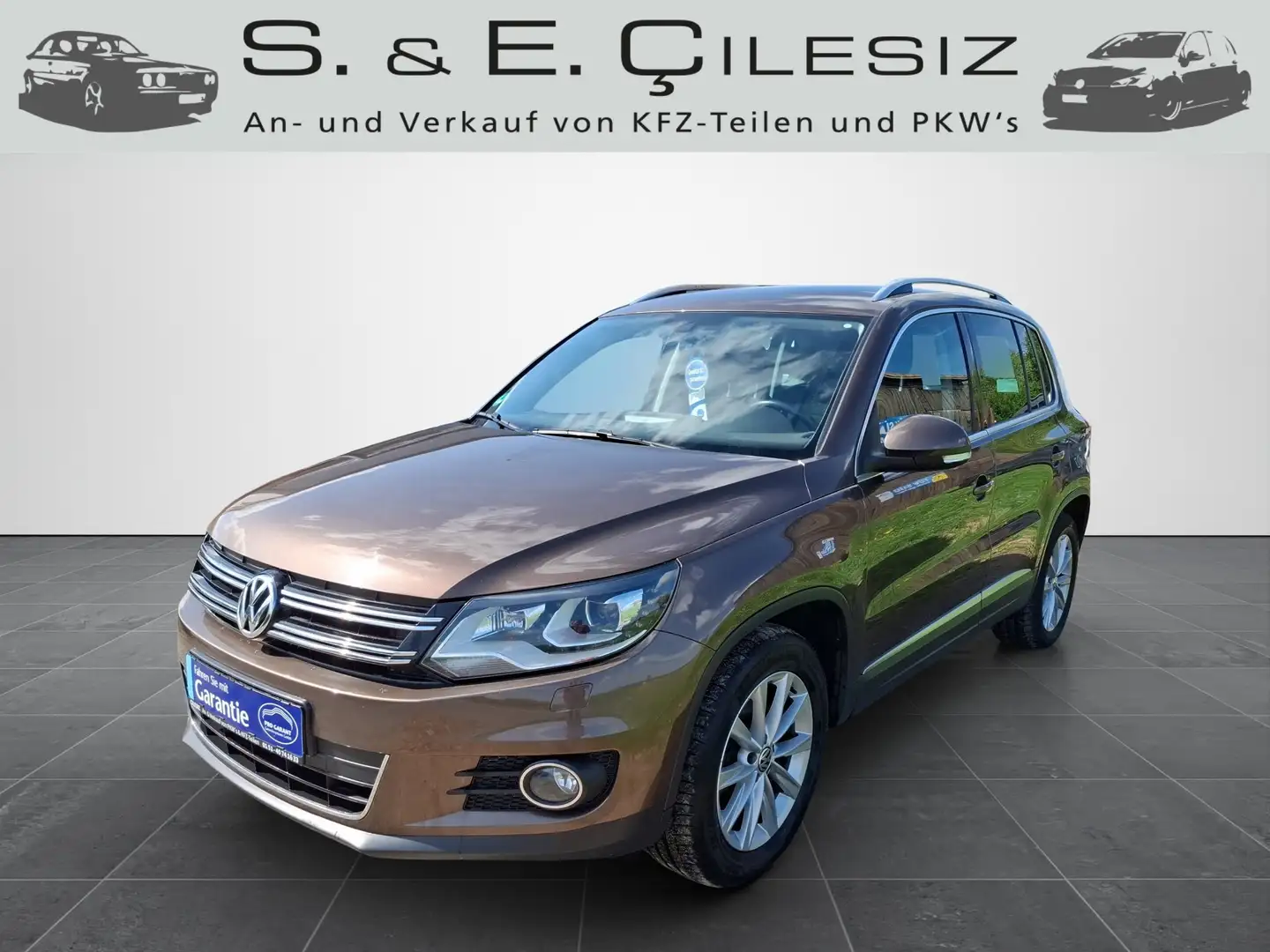 Volkswagen Tiguan Sport Braun - 1