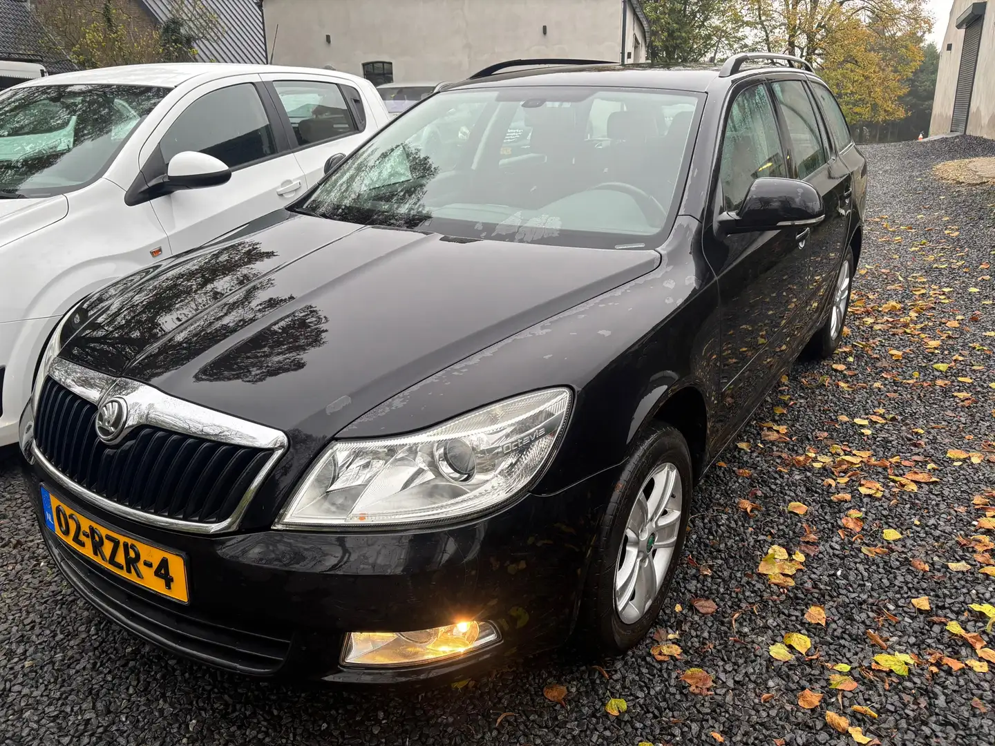 Skoda Octavia Combi 1.2 TSI Ambition Business Line NAVIGATIE Schwarz - 1