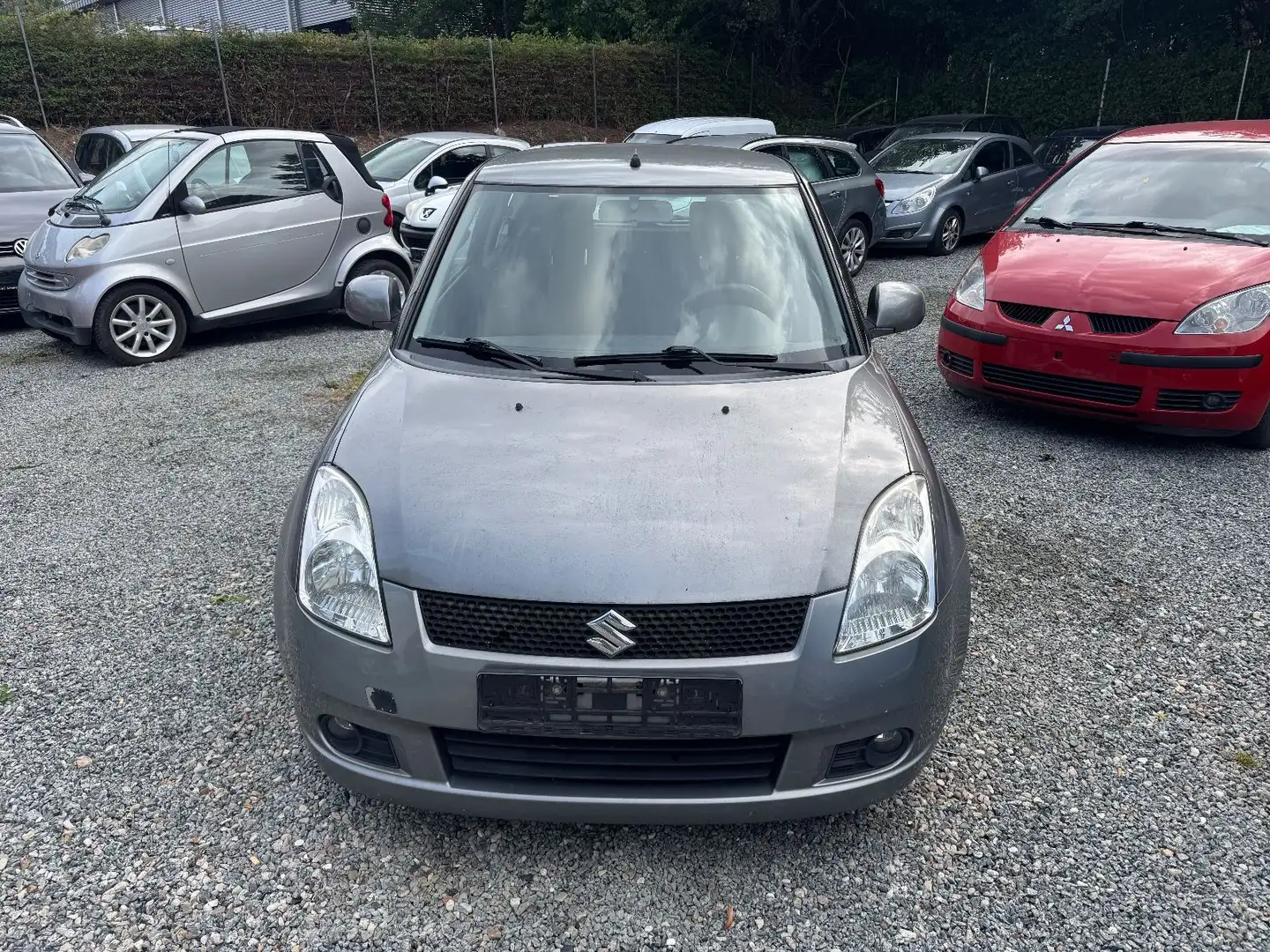 Suzuki Swift Lim. Classic Gris - 1