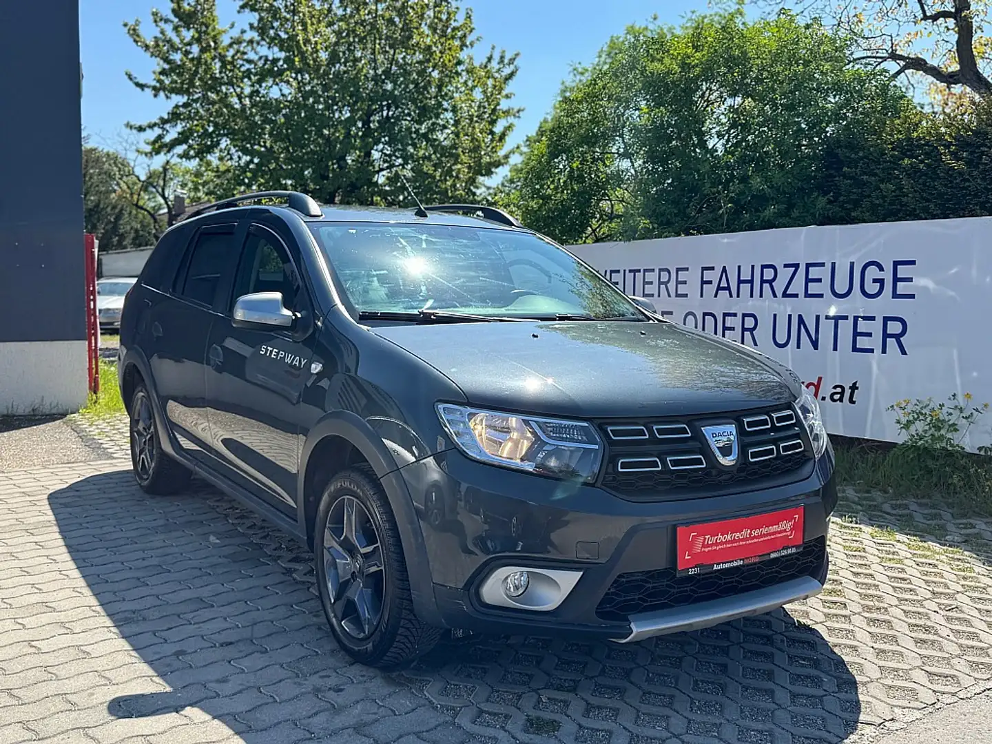 Dacia Logan Stepway | NAVI | TEILLEDER | Grijs - 1