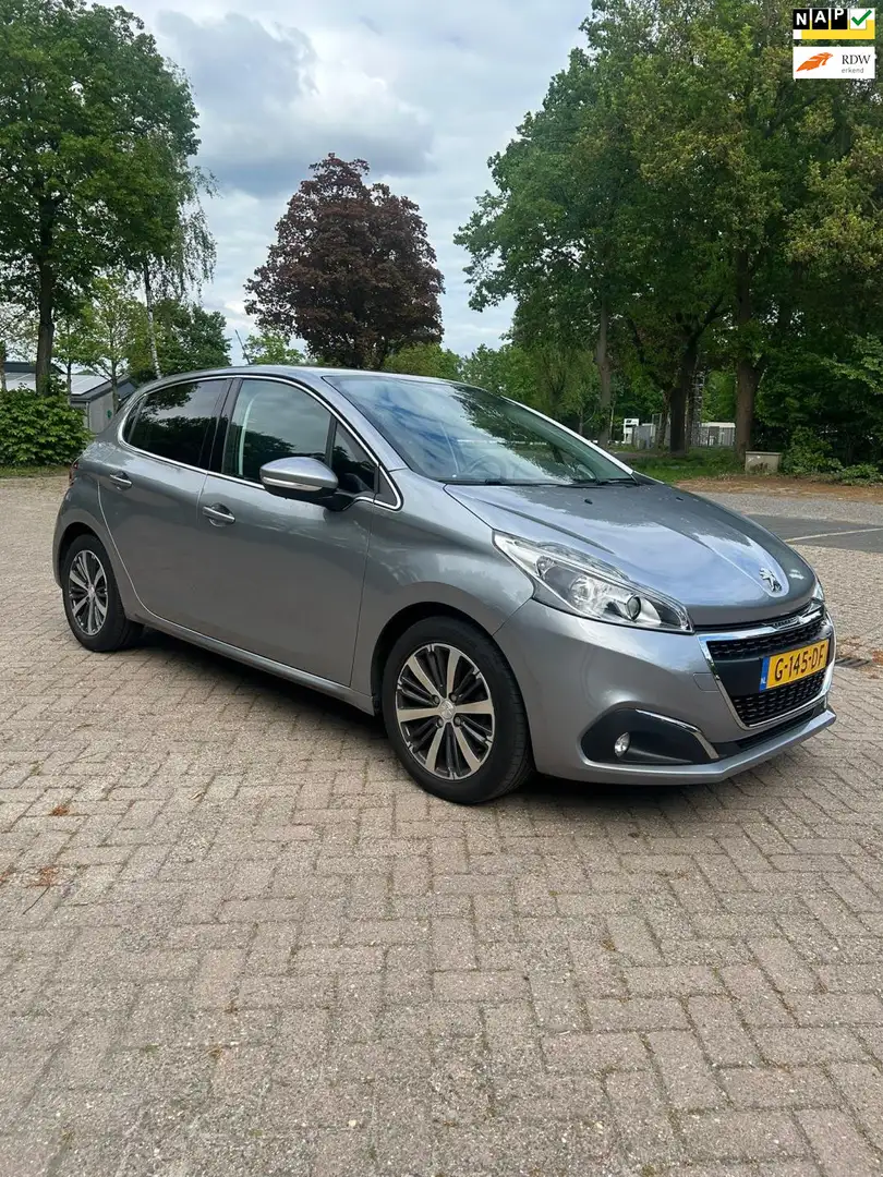 Peugeot 208 1.2 PureTech Allure 5 Deurs Navigatie apple carpla Grijs - 1