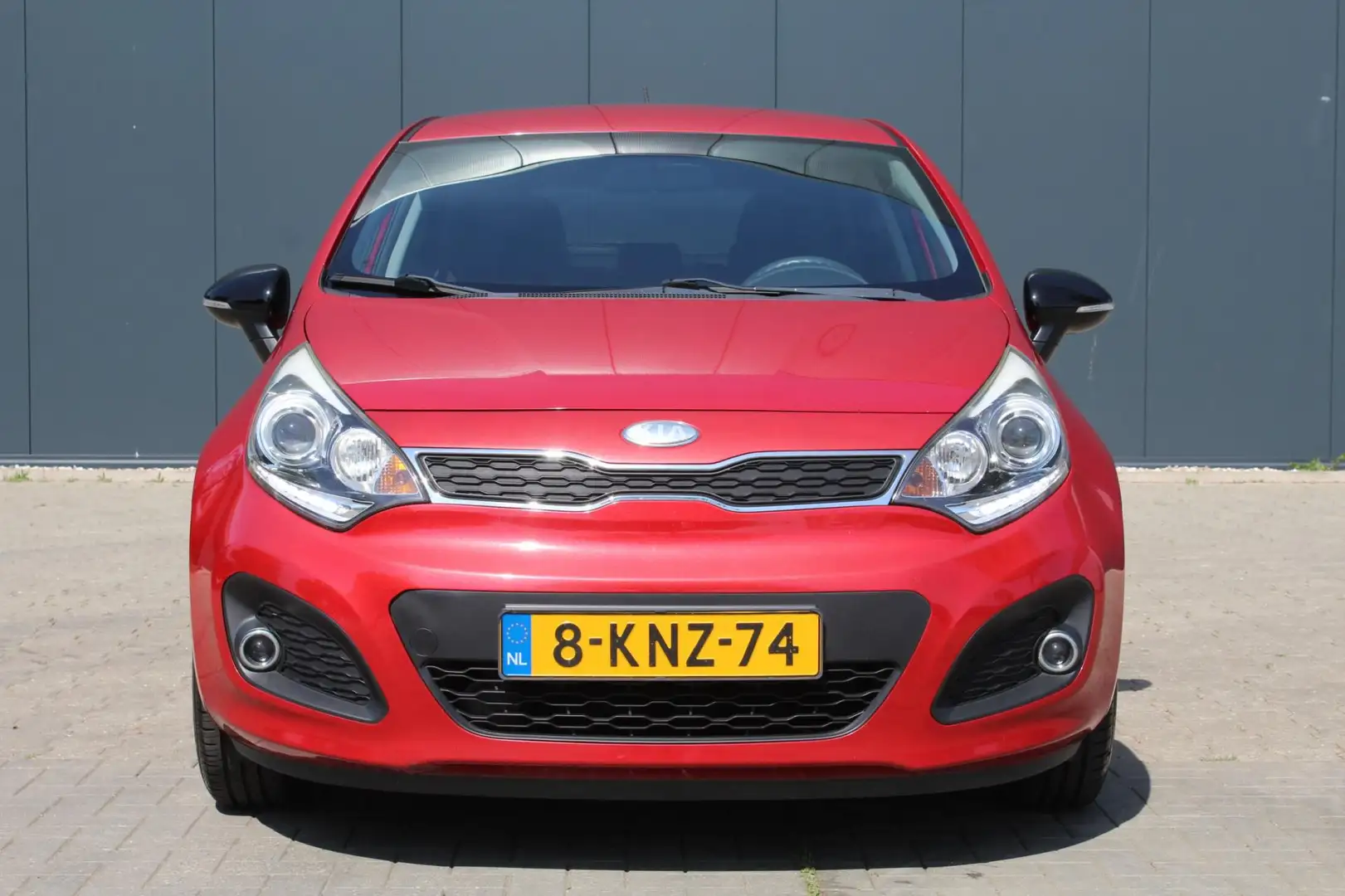 Kia Rio 1.2 CVVT Plus Pack | Airco | 5 Deurs | NAP | APK | Rood - 2
