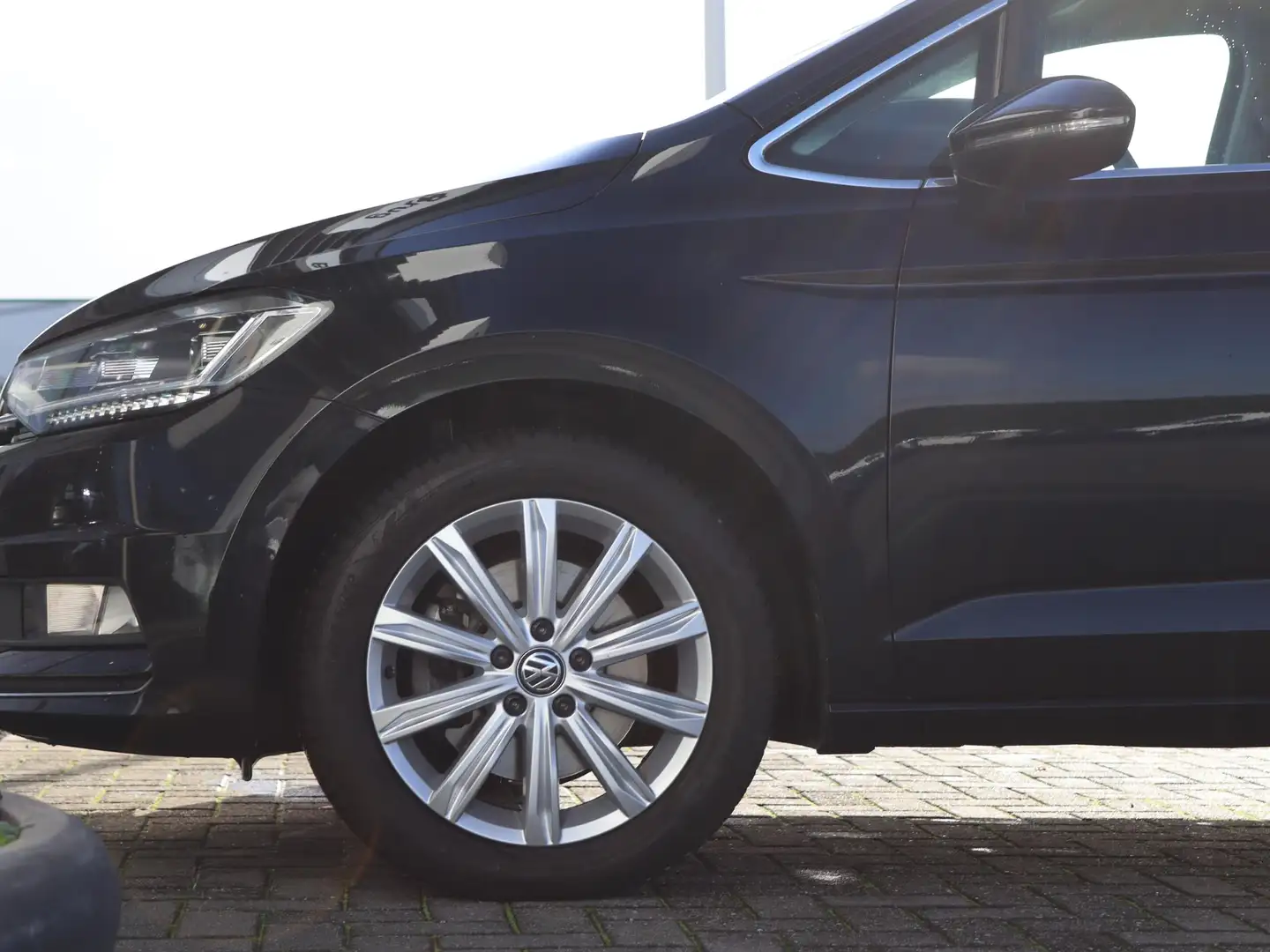Volkswagen Touran 1.4 TSI 150 pk DSG Highline 7p | Trekhaak | Naviga Noir - 2