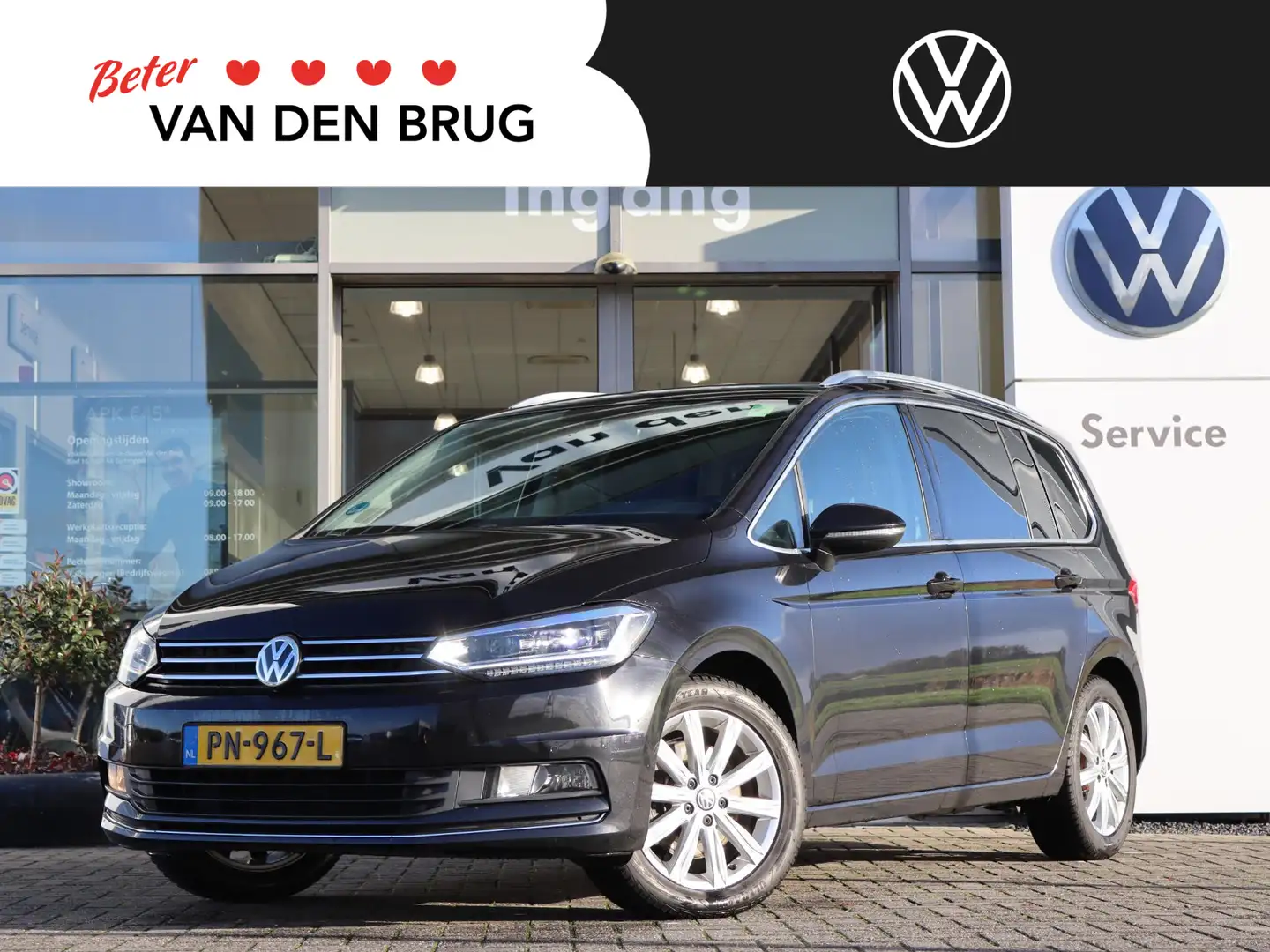 Volkswagen Touran 1.4 TSI 150 pk DSG Highline 7p | Trekhaak | Naviga Noir - 1