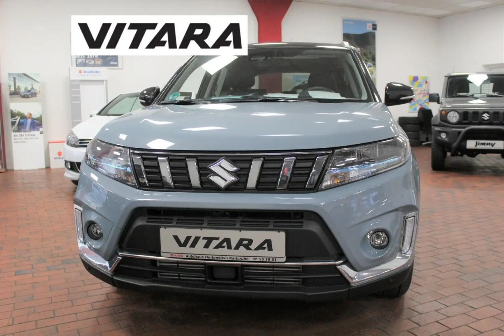 Suzuki Vitara 1.5 Hybrid Comfort+ "AHK" Blauw - 1