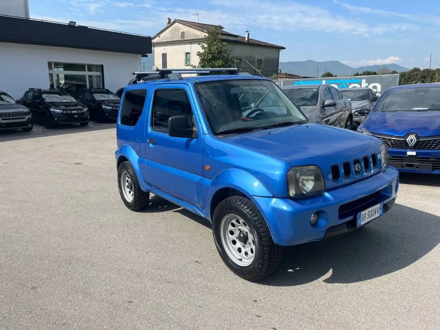 Suzuki Jimny 1.3i 16V cat 4WD JLX Blu/Azzurro - 2