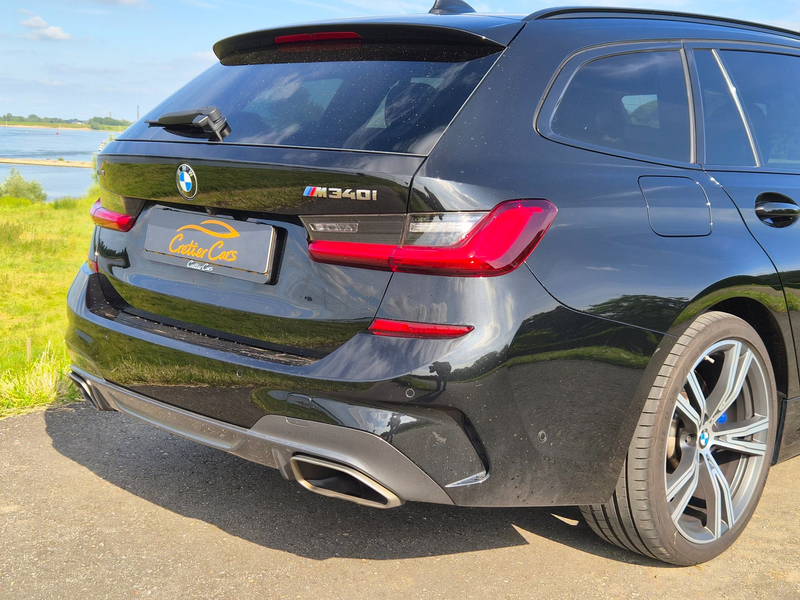 BMW 340 3-serie Touring M340i xDrive High Executive | Pano — photo 23