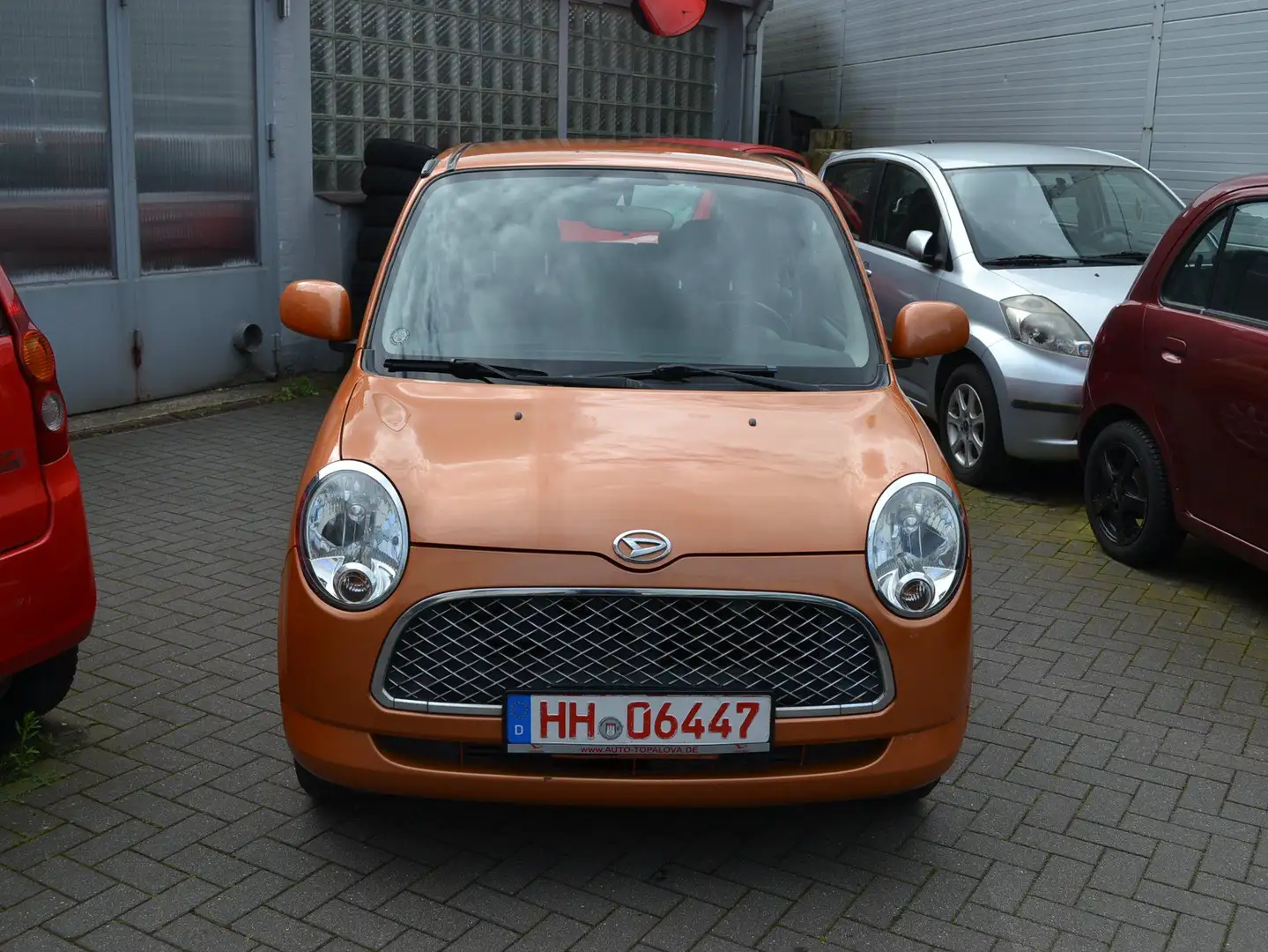 Daihatsu Trevis 1.0 Momo Ganzjahresreifen II Hand Viele Neuteile Orange - 1