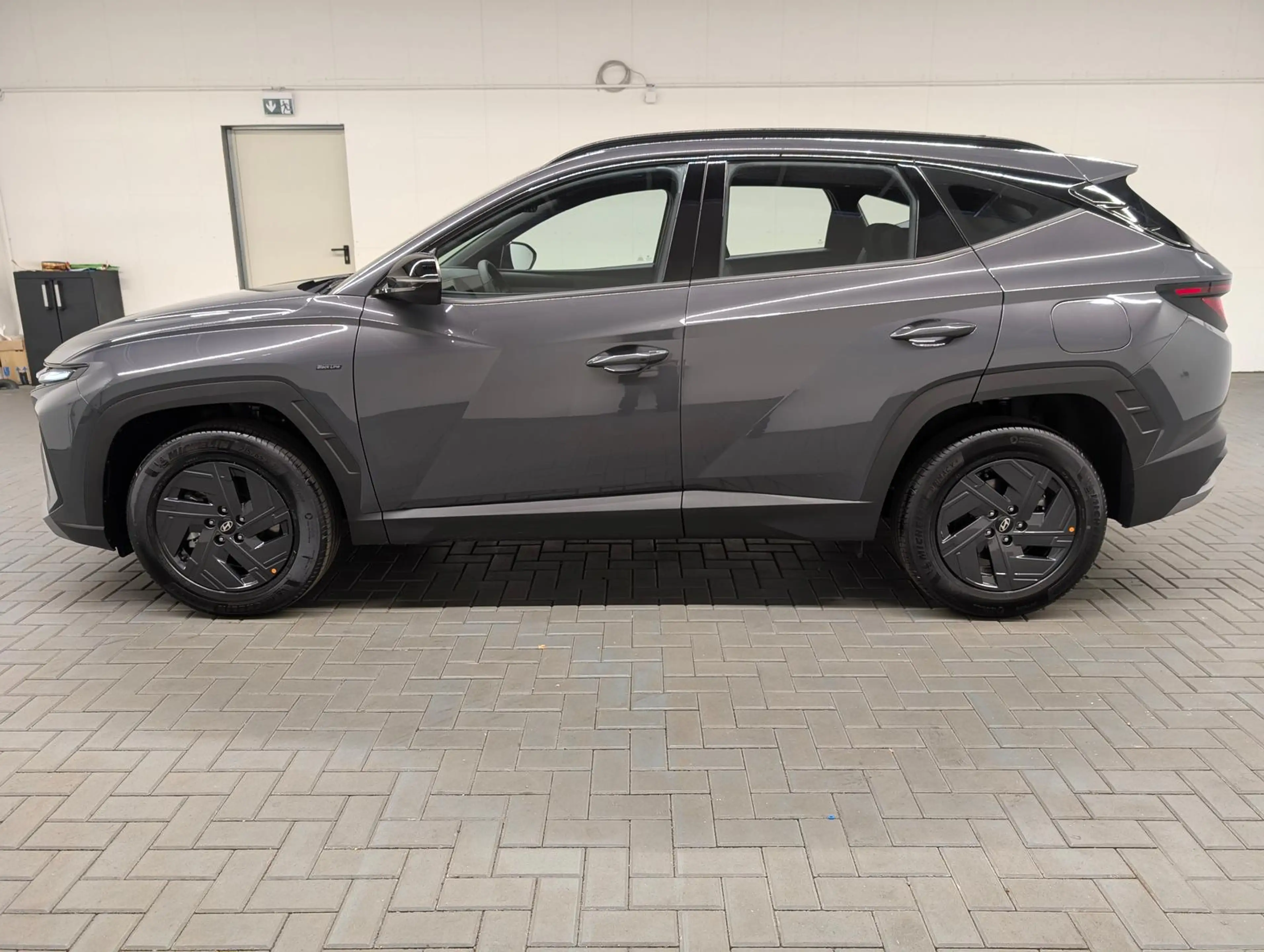 Hyundai TUCSON HEV Black Line LED/Kam/SHZ/Navi/Tempomat — photo 2