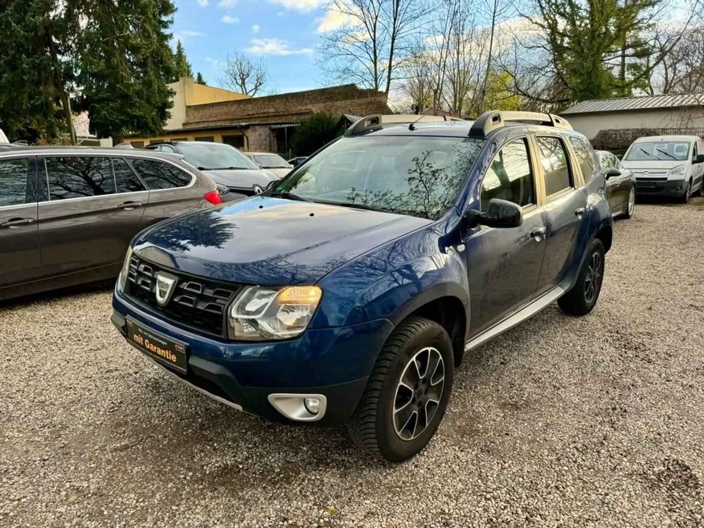 Dacia Duster TCe 125 4x2 Navi Klima Alu Scheckheft I.Hand PDC Blau - 1