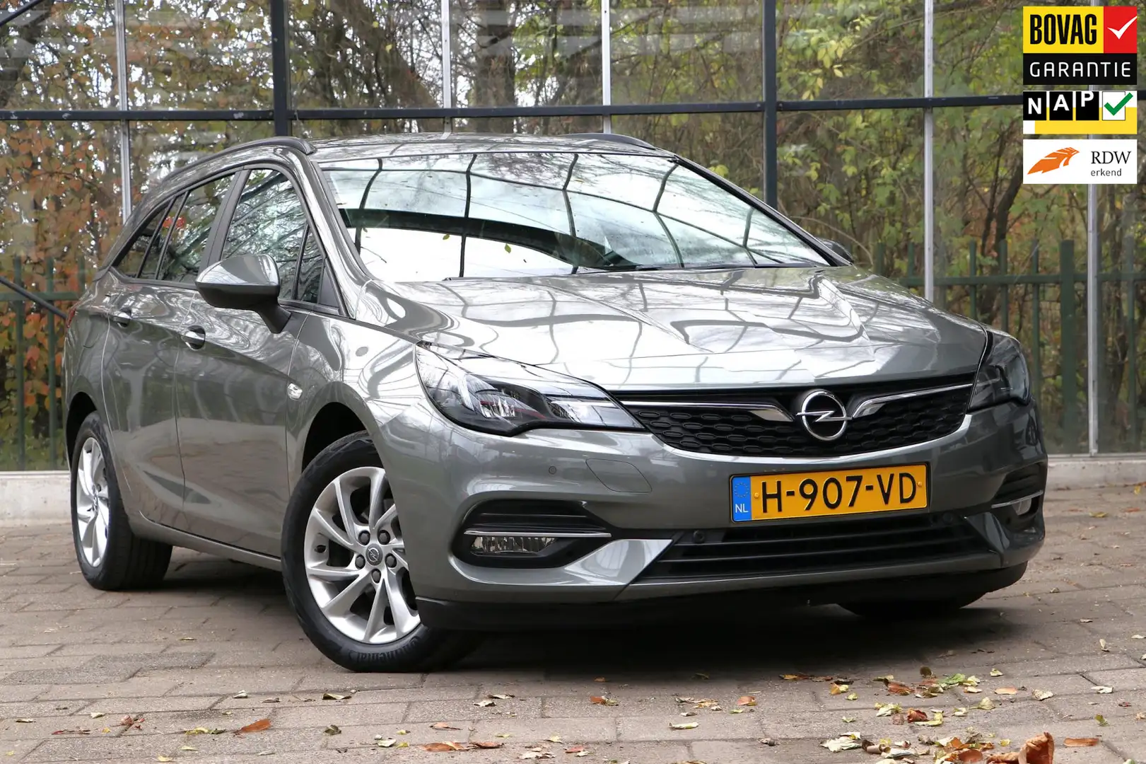 Opel Astra 1.2 Edition LED / Camera + PDC / Carplay / Trekhaa Grijs - 1
