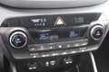 Hyundai TUCSON 1.6 GDi Comfort / Navigatie / Climate Control / Cr Grijs - thumbnail 4