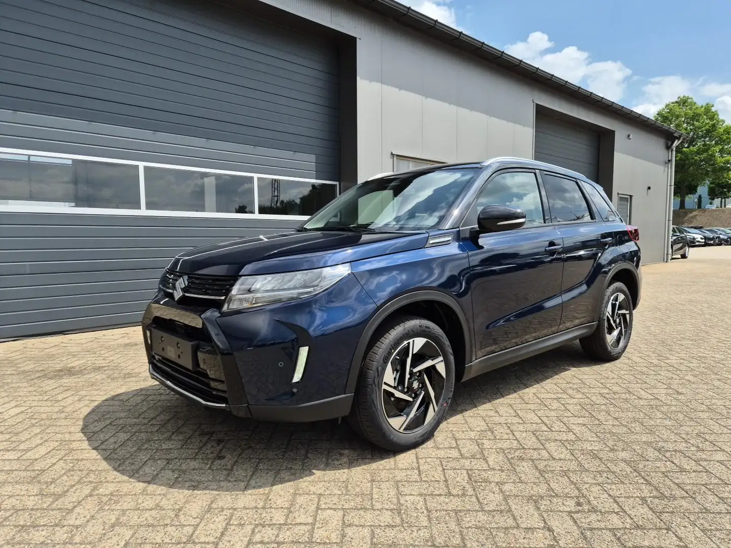 Suzuki Vitara 1.4 Boosterjet 129PS Hybrid Comfort+ Teilleder mit Bleu - 1