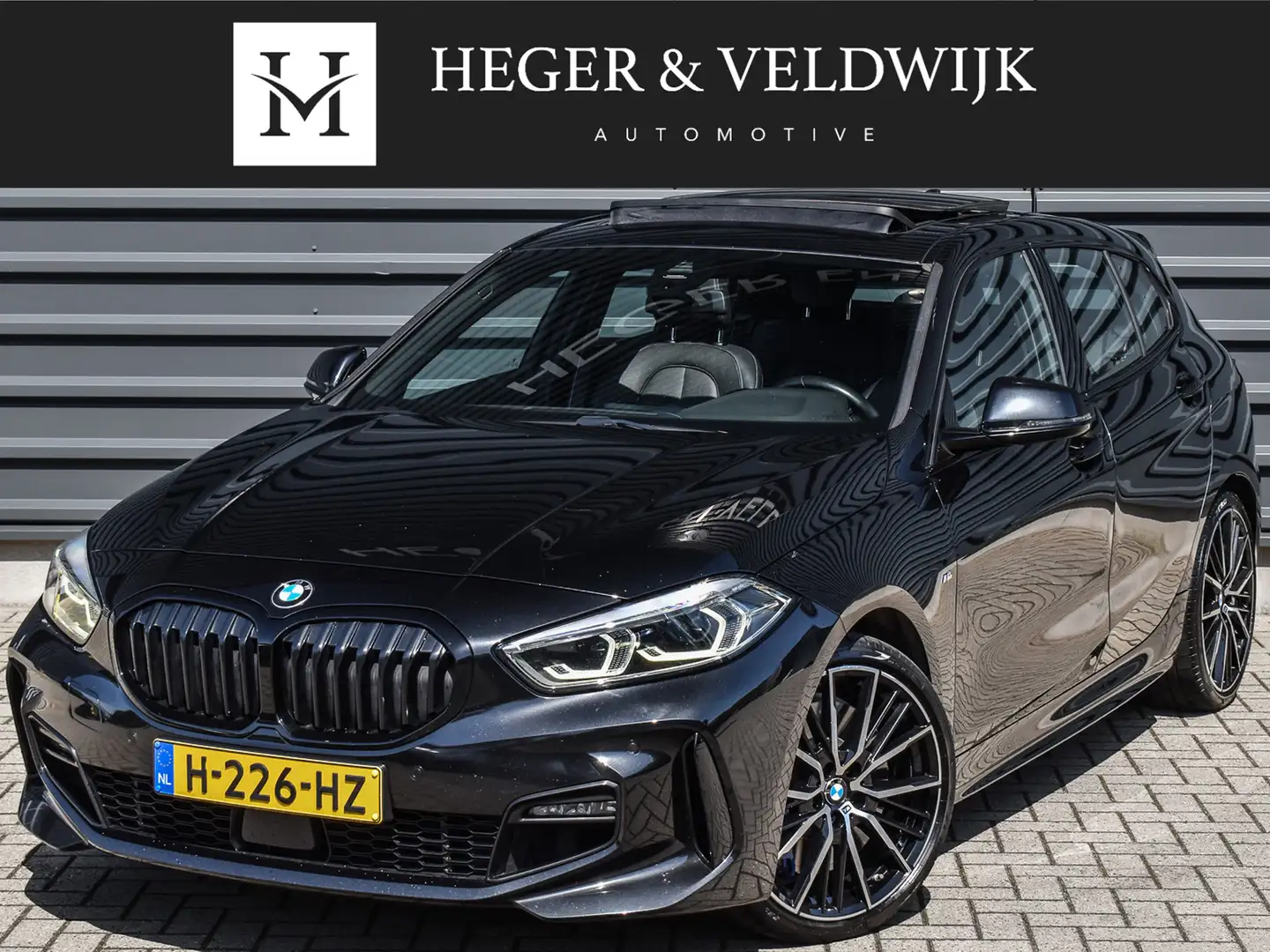 BMW 118 1-serie 118i HIGH EXECUTIVE EDITION | M-SPORT | SC Zwart - 1