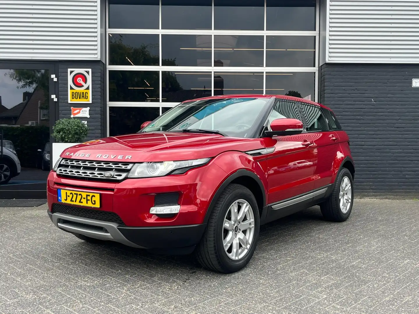 Land Rover Range Rover Evoque 2.0 Si 4WD Pure, Automaat, Airco, Cruise, Trekhaak Rood - 1