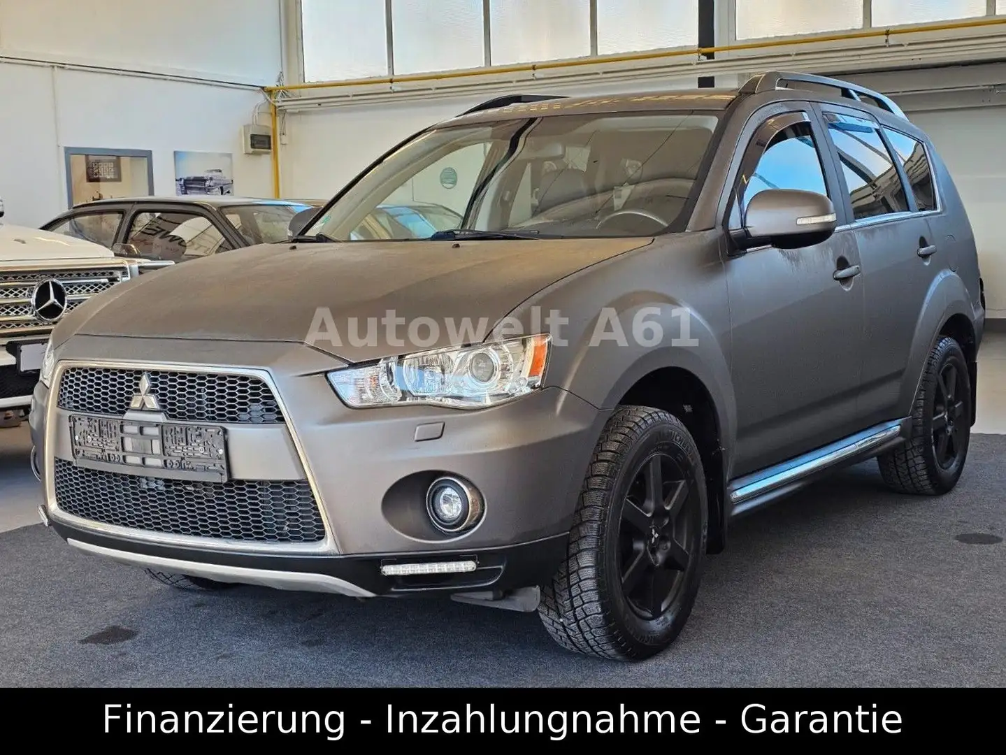 Mitsubishi Outlander XTRA 2.3 AHK+LEDER+XENON+MY13÷GARANTIE Grau - 1