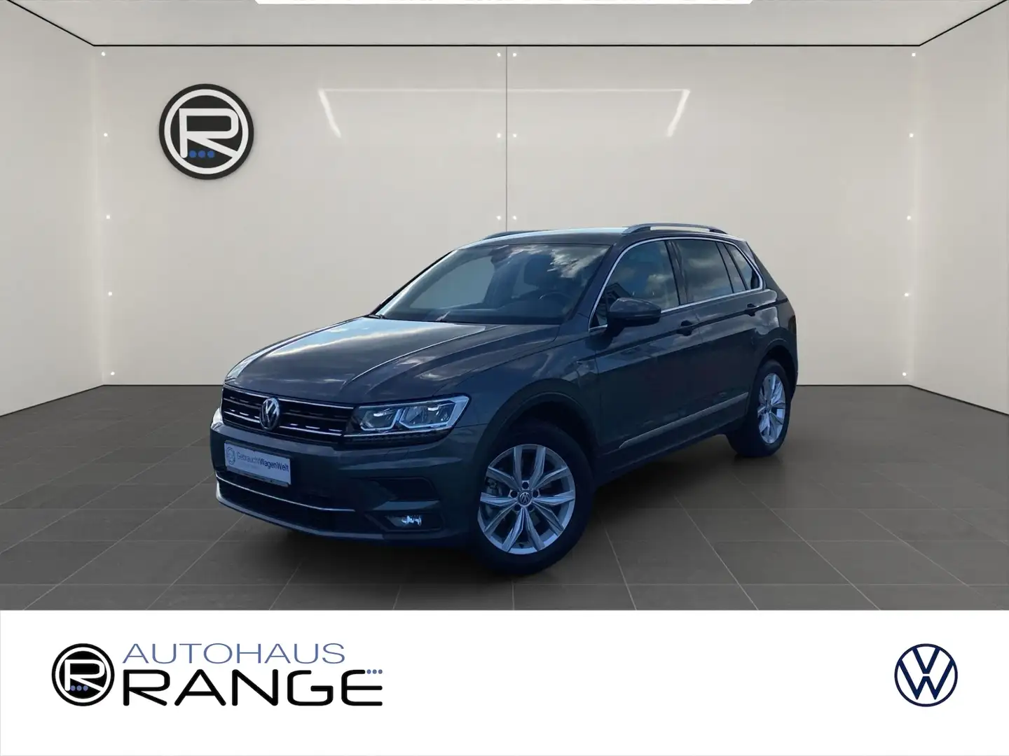Volkswagen Tiguan 2.0 TSI Highline 4Motion *PDC STDHZ* Grijs - 1