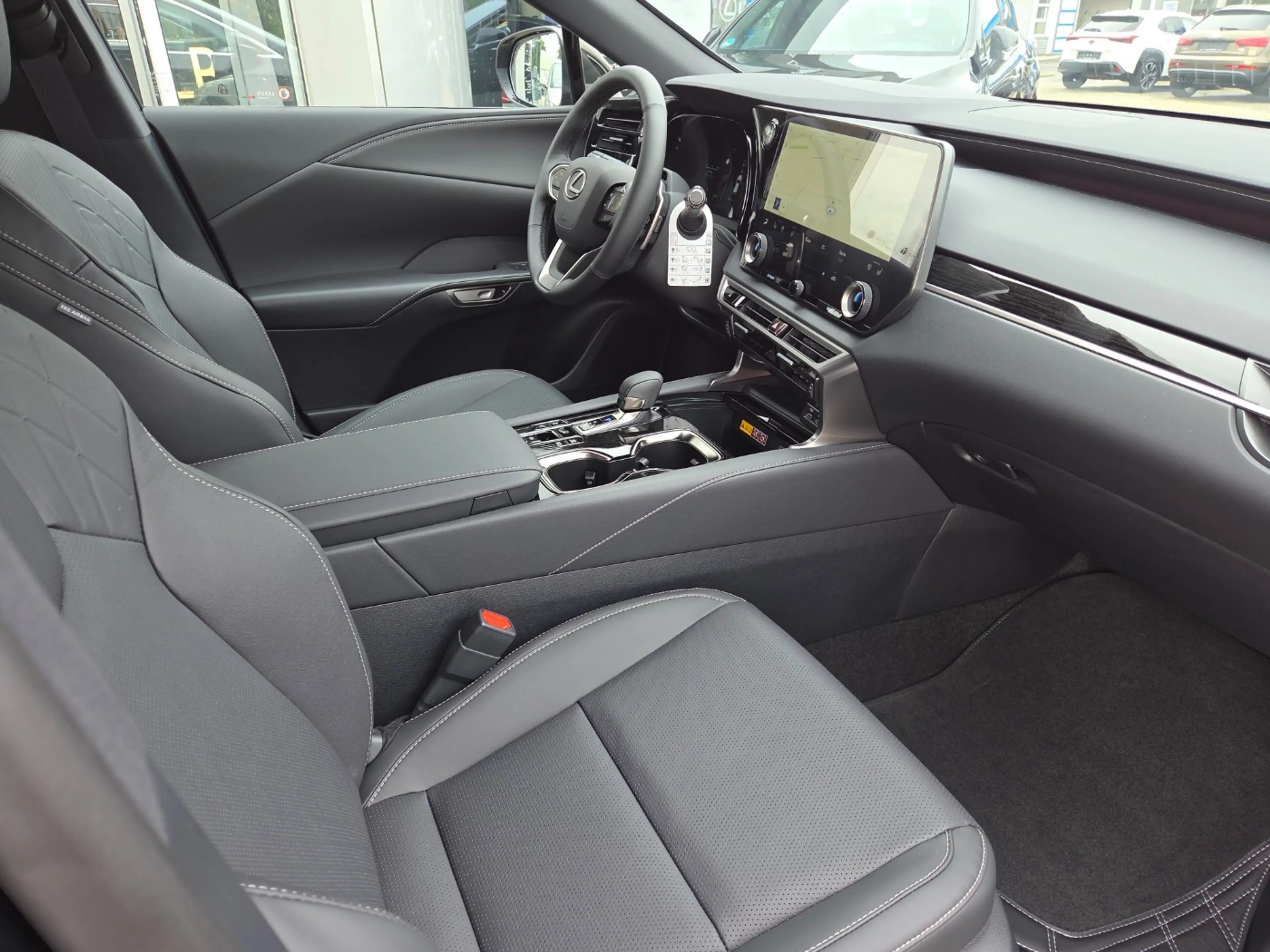 Lexus RX 450h RX 450 h+ E-Four F Sport Panoramadach — photo 11