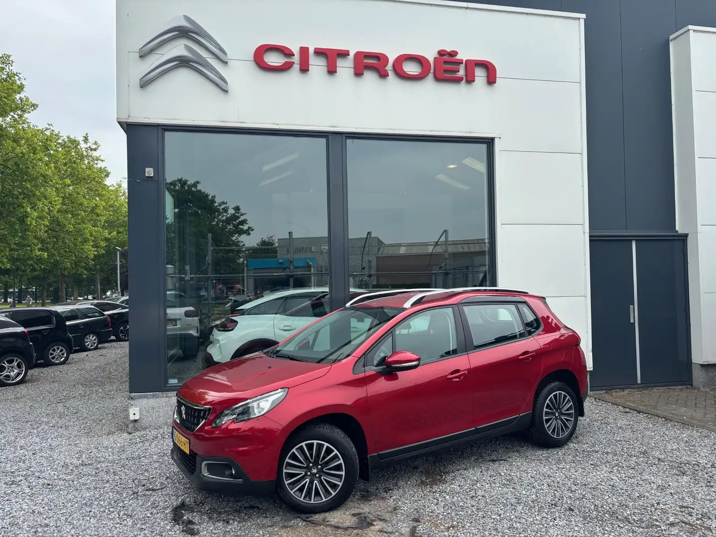 Peugeot 2008 1.2 PureTech Blue Lion vol automaat! | Rijklaar ge Rouge - 2