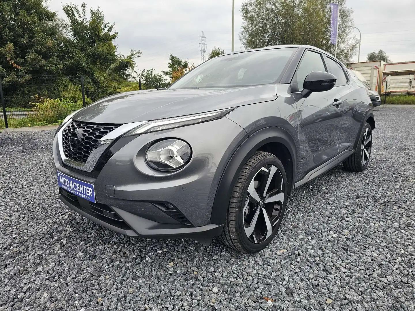 Nissan Juke 1.0 DIG-T 2WD // GPS / GARANTIE 1 AN // Gris - 1