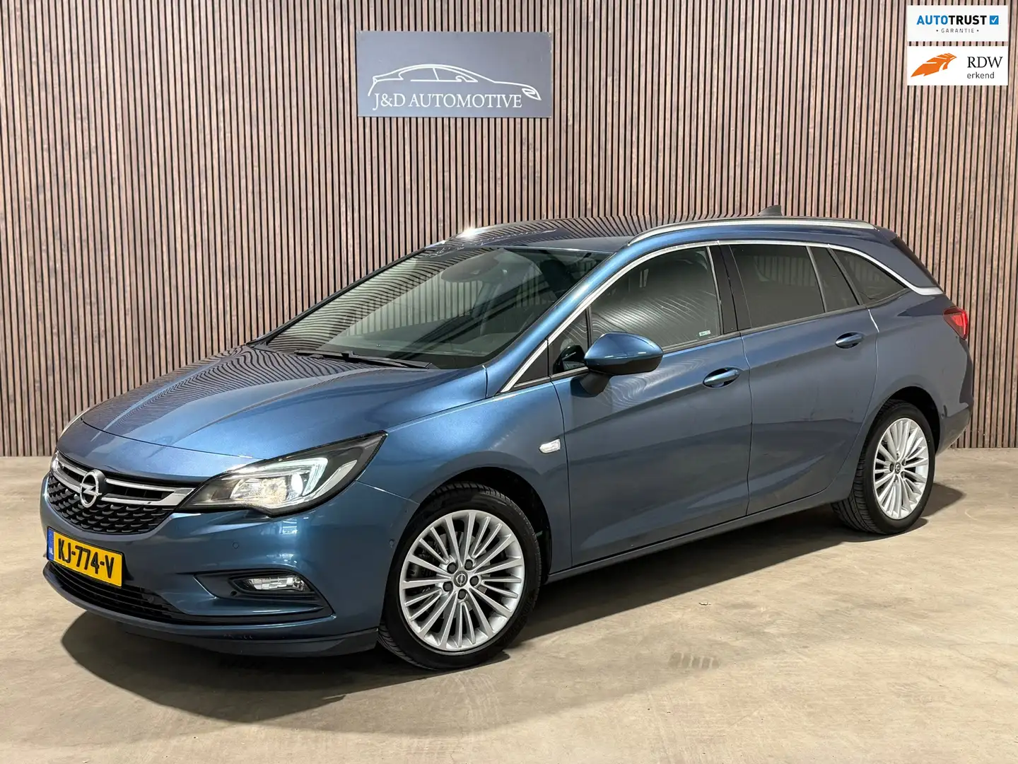 Opel Astra Sports Tourer 1.6 CDTI Innovation 2016 NAP PDC Blauw - 1