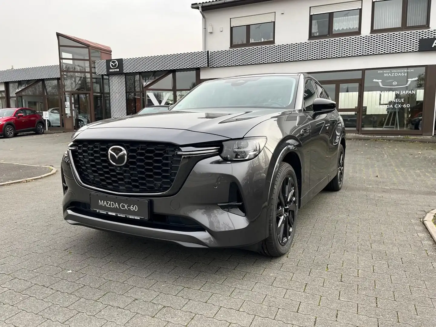 Mazda CX-60 e-Skyactiv PHEV Homura,FZ mit schw.Felgen,AHK,Gara Grau - 1
