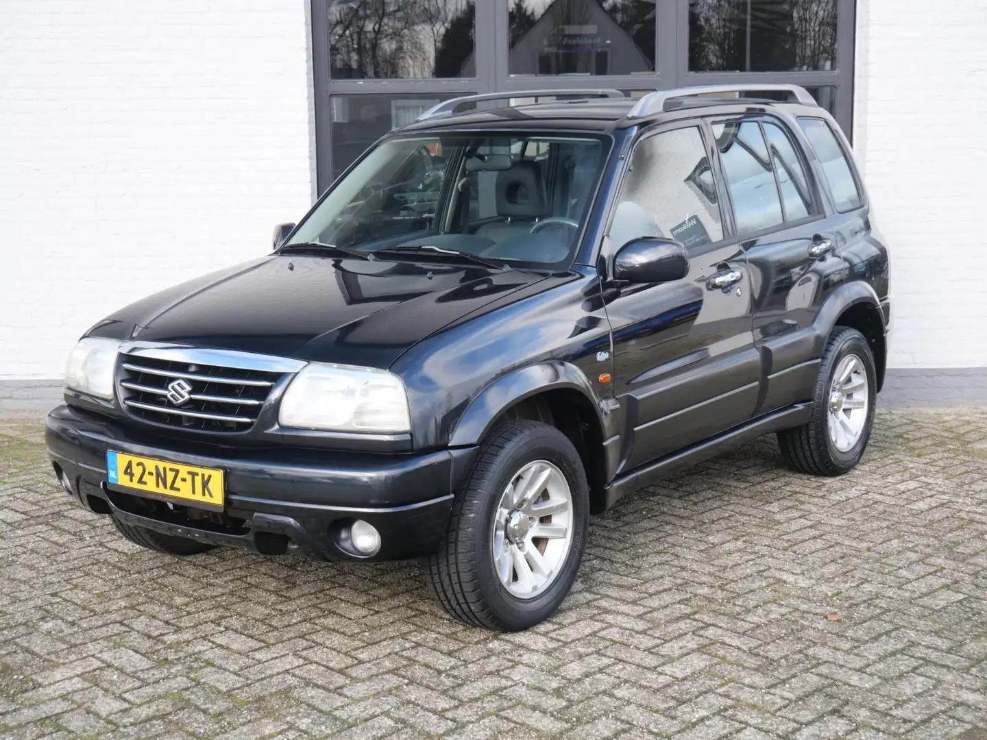 Suzuki Grand Vitara 2.0 FreeStyle-3 Airco Leder 123.000km !!! 2e eigen Schwarz - 1